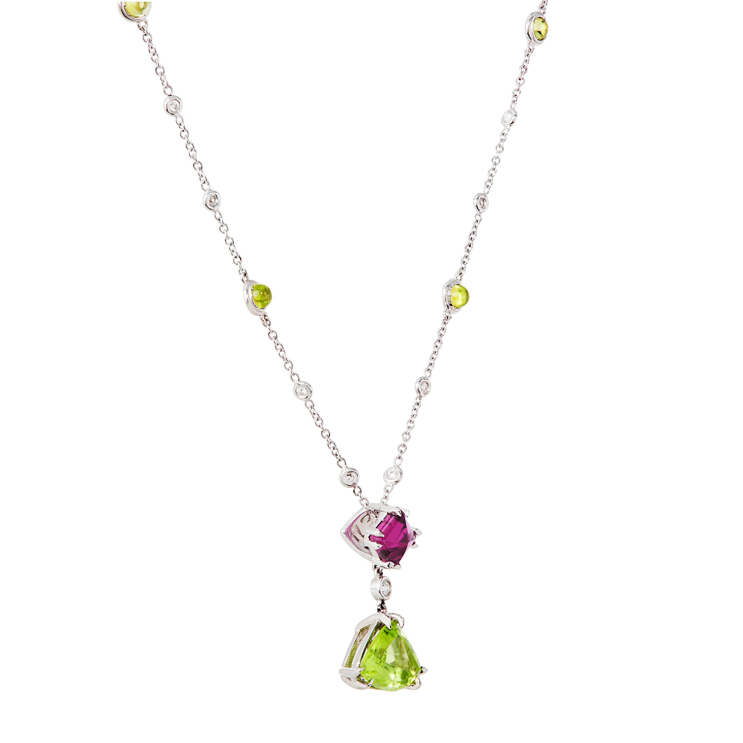 The play of color between the Sugarloaf Cut Rubellite Tourmaline and Peridot are reminiscent of a sweet shop with their vibrance and frivolity. Part of a one of a kind Kiersten Elizabeth set where comfort and versatility are paramount.

There are