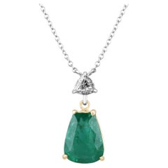 5.58tcw 18K Irregular Cut Emerald & Trillion Cut Diamond Accent Pendant Necklace