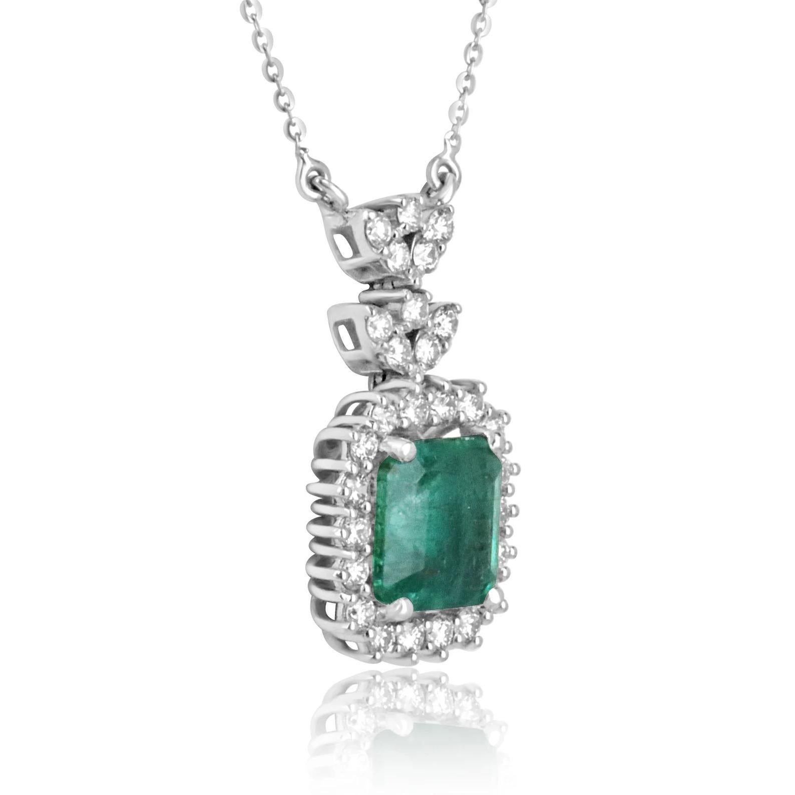 A special and intimate piece, this is a remarkable natural emerald and diamond necklace. The center stone features a ravishing and large 4.58-carat, natural asscher cut emerald with a deep medium dark green color and bluish-green hue. Jardin, carbon