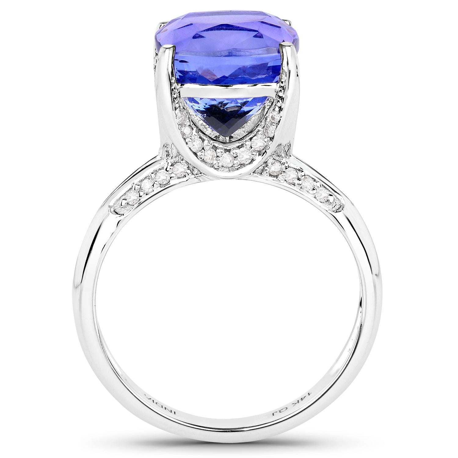 5.59 Carat Cushion-shaped Tanzanite and 0.18 Carats White Diamond 14 Karat White Gold Ring

Center Stone Details:
Stone: Tanzanite
Shape: Cushion
Size: 9.50mm
Weight: 5.59 carat

Diamond Details:
Shape: Round Brilliant (34)
Carat Weight: 0.18