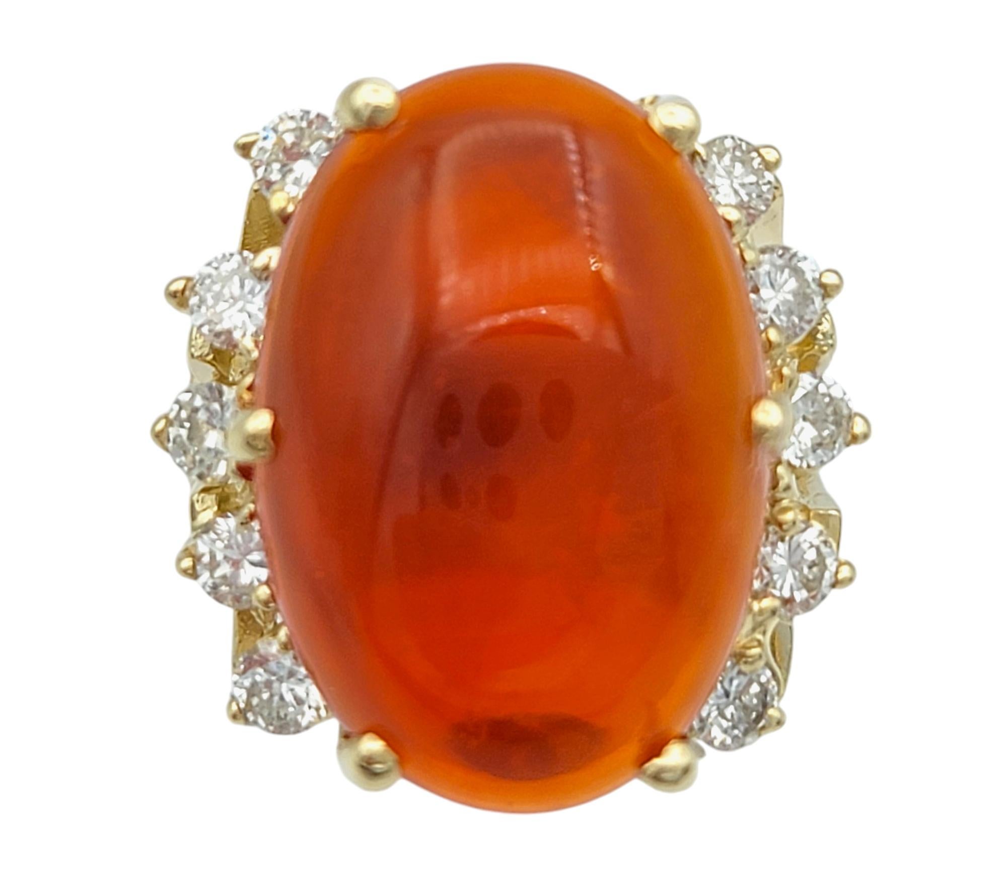 Contemporary 5.59 Carat Oval Cabochon Red Fire Opal and Diamond Ring in 14 Karat Yellow Gold For Sale