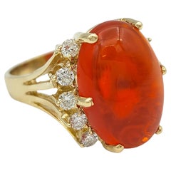 5.59 Carat Oval Cabochon Red Fire Opal and Diamond Ring in 14 Karat Yellow Gold
