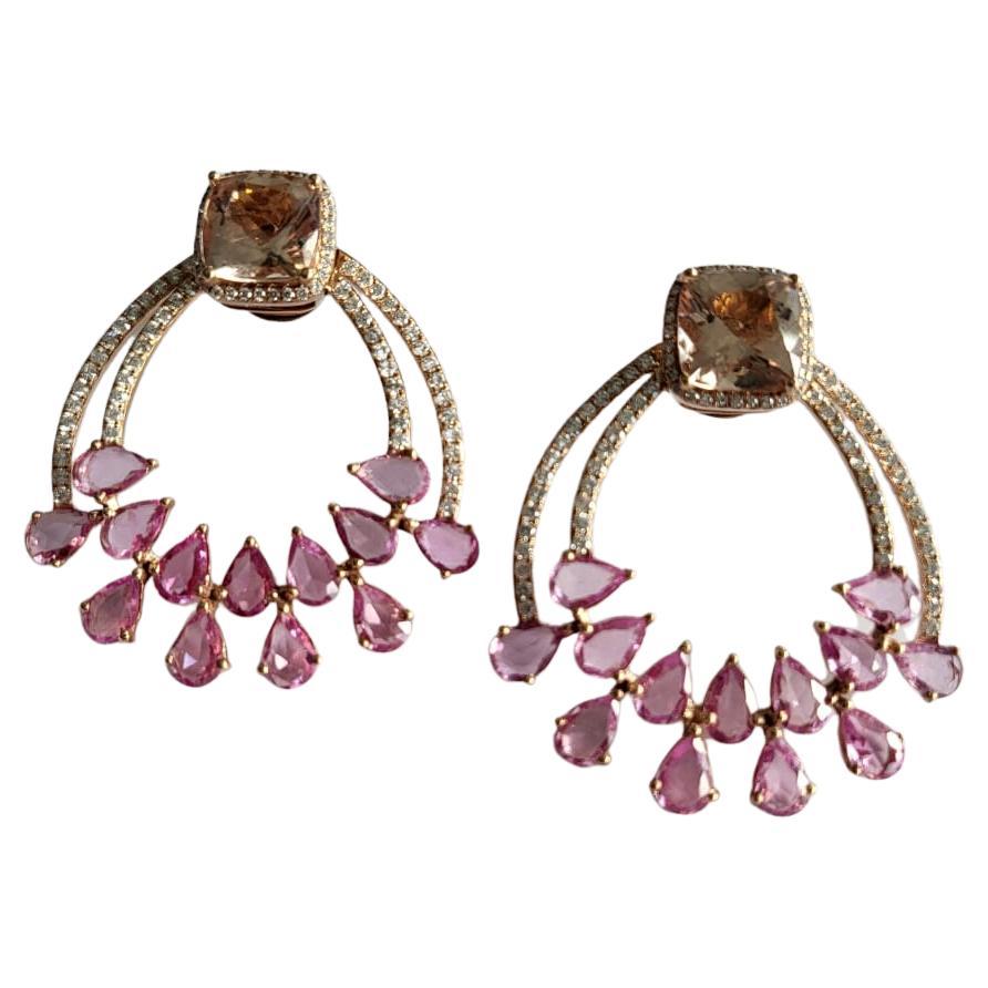 A very gorgeous and beautiful, Morganite & Pink Sapphire Earrings set in 18K Rose Gold & Diamonds. The weight of the Morganite is 5.59 carats. The weight of the Pink Sapphires is 7.69 carats. The Pink Sapphires are of Ceylon (Sri Lanka) origin. The