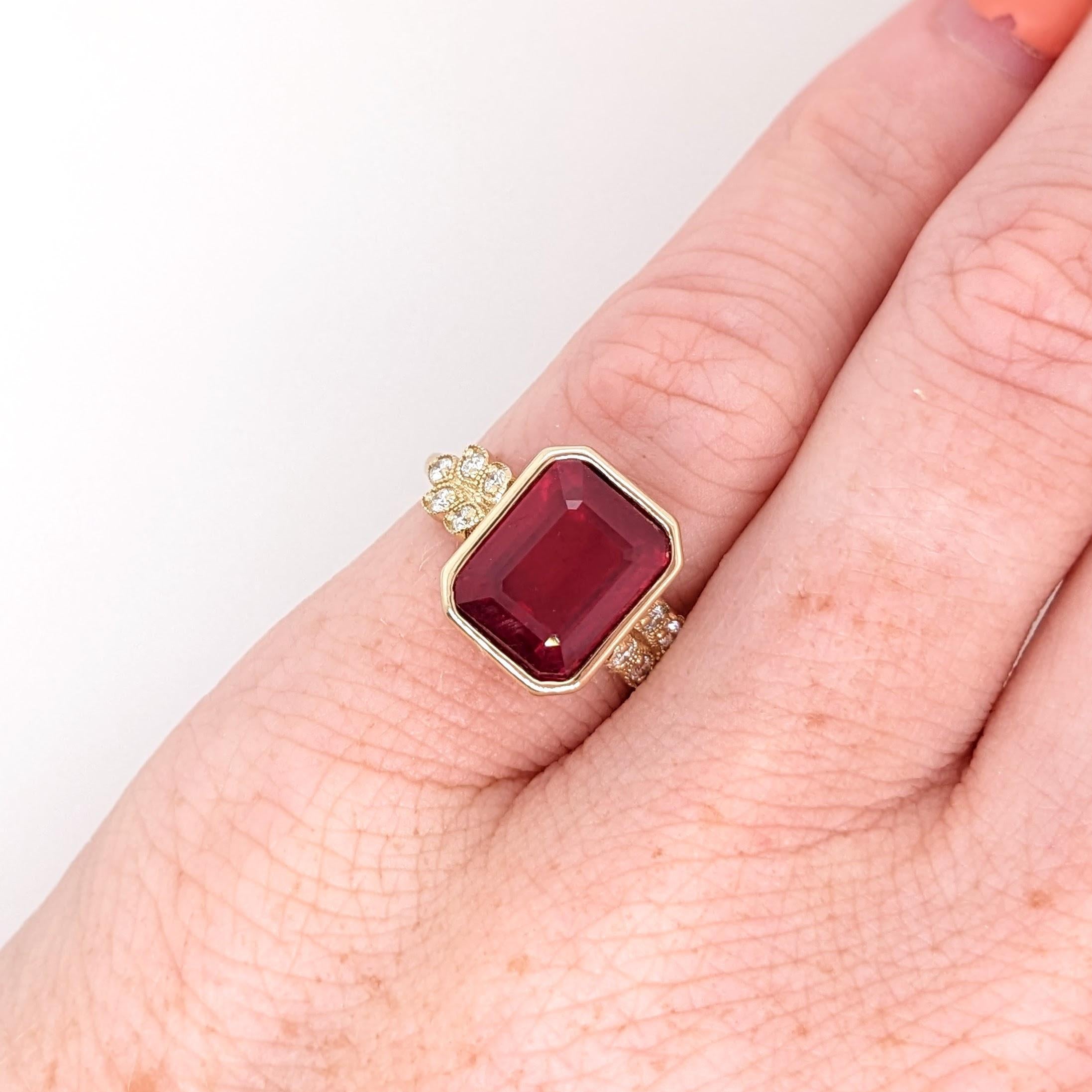 This beautiful ring features a 5.5 carat emerald cut Ruby gemstone with natural earth mined diamonds and milgrain detail, all set in solid 14K gold. This ring makes a lovely July birthstone gift for your loved ones!

**We offer complimentary