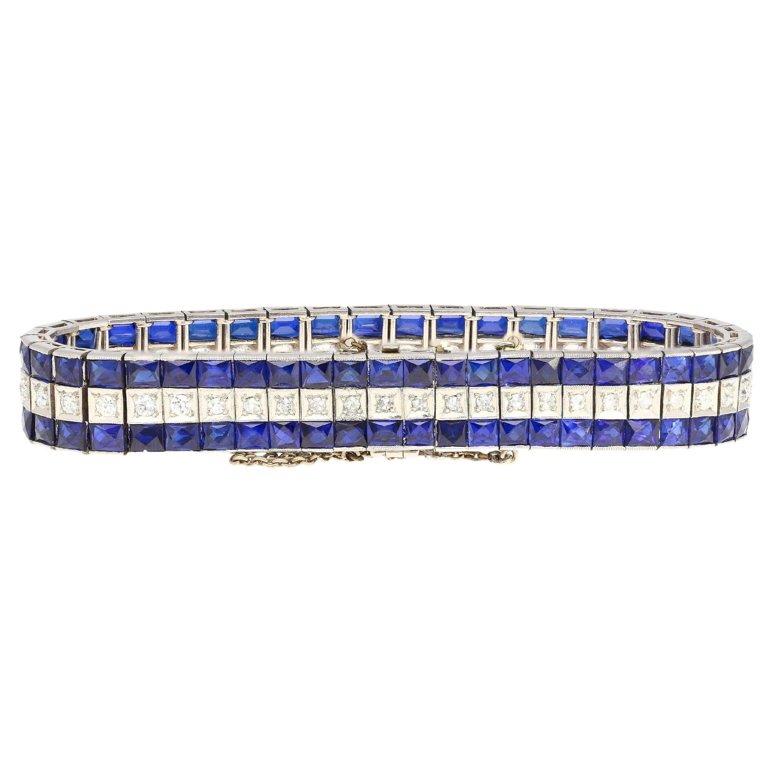 5.50 Carat Vintage Art Deco Platinum Bracelet With Diamonds and Synthetic Blue Sapphires. Synthetic sapphires and rubies were common in the late Art Deco and retro era. As seen in this masterfully handmade piece of history. A heavy 43.96-gram build