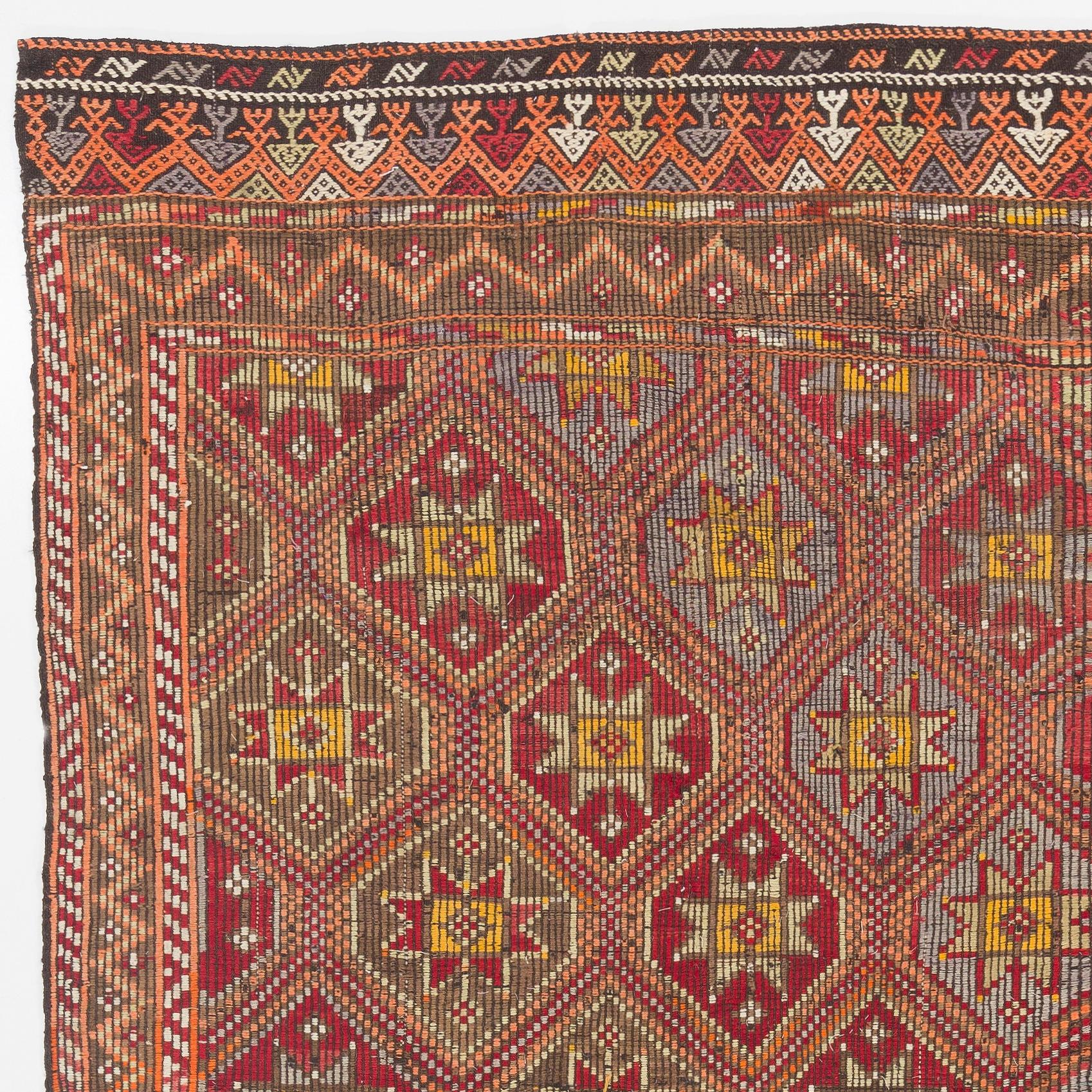 This attractive flat-weave rug is handwoven in fine local wool to create a sturdy floor covering. This type of Kilims (woven in the intricate 