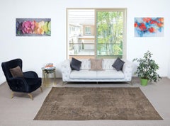 5.5x9.3 Ft Vintage Turkish Area Rug redyed in Brown Color for modern interiors