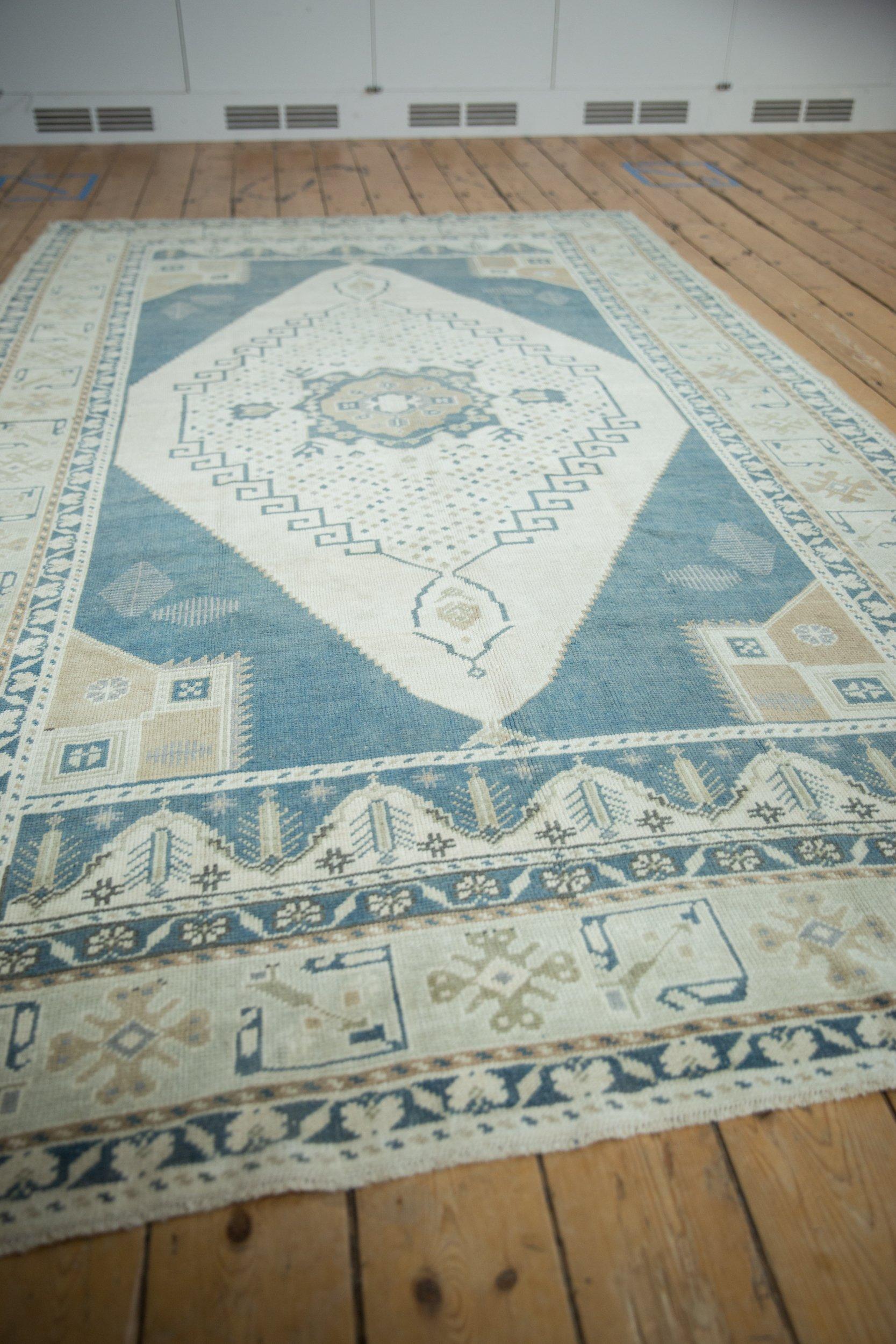 Late 20th Century Vintage Distressed Oushak Carpet For Sale