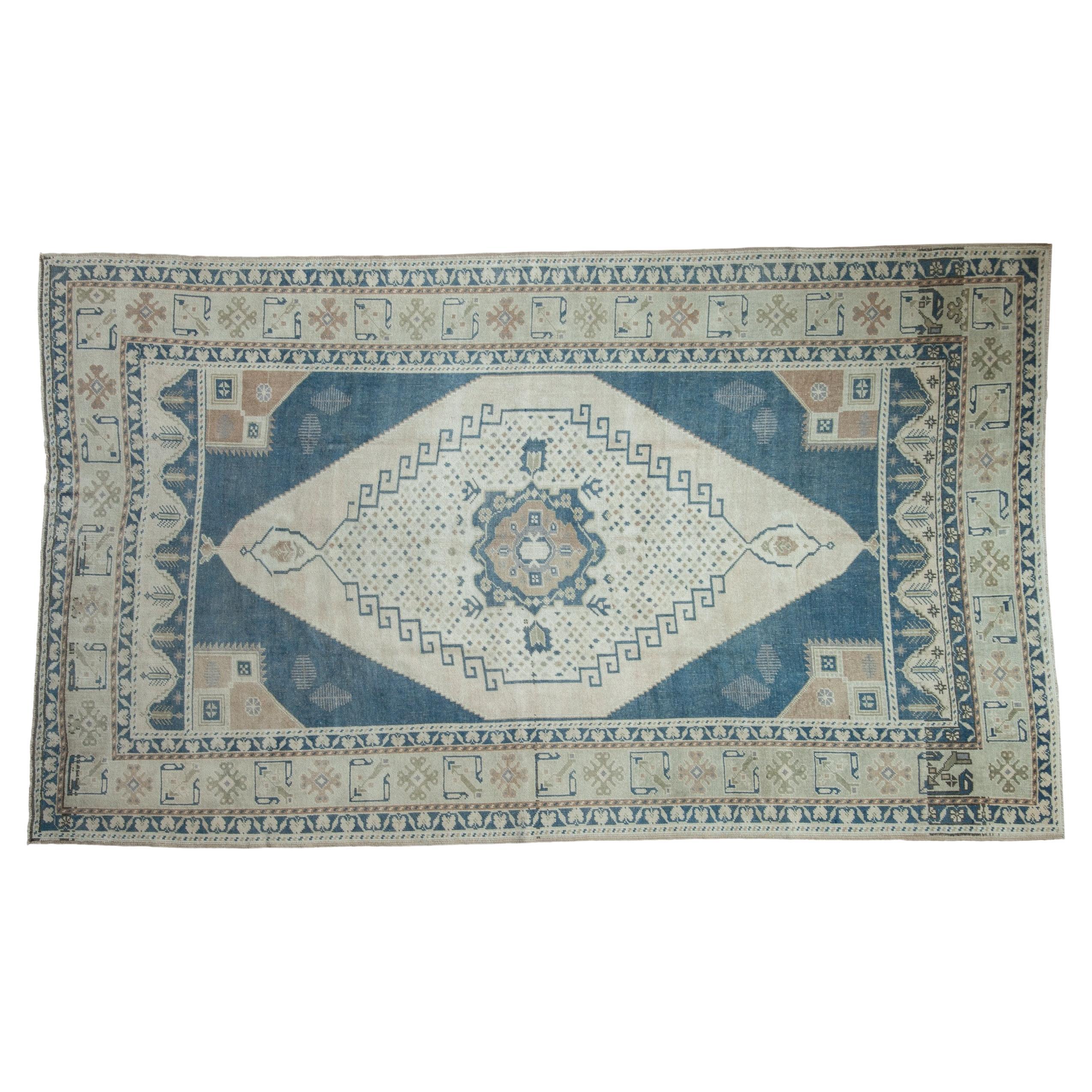 Vintage Distressed Oushak Carpet For Sale