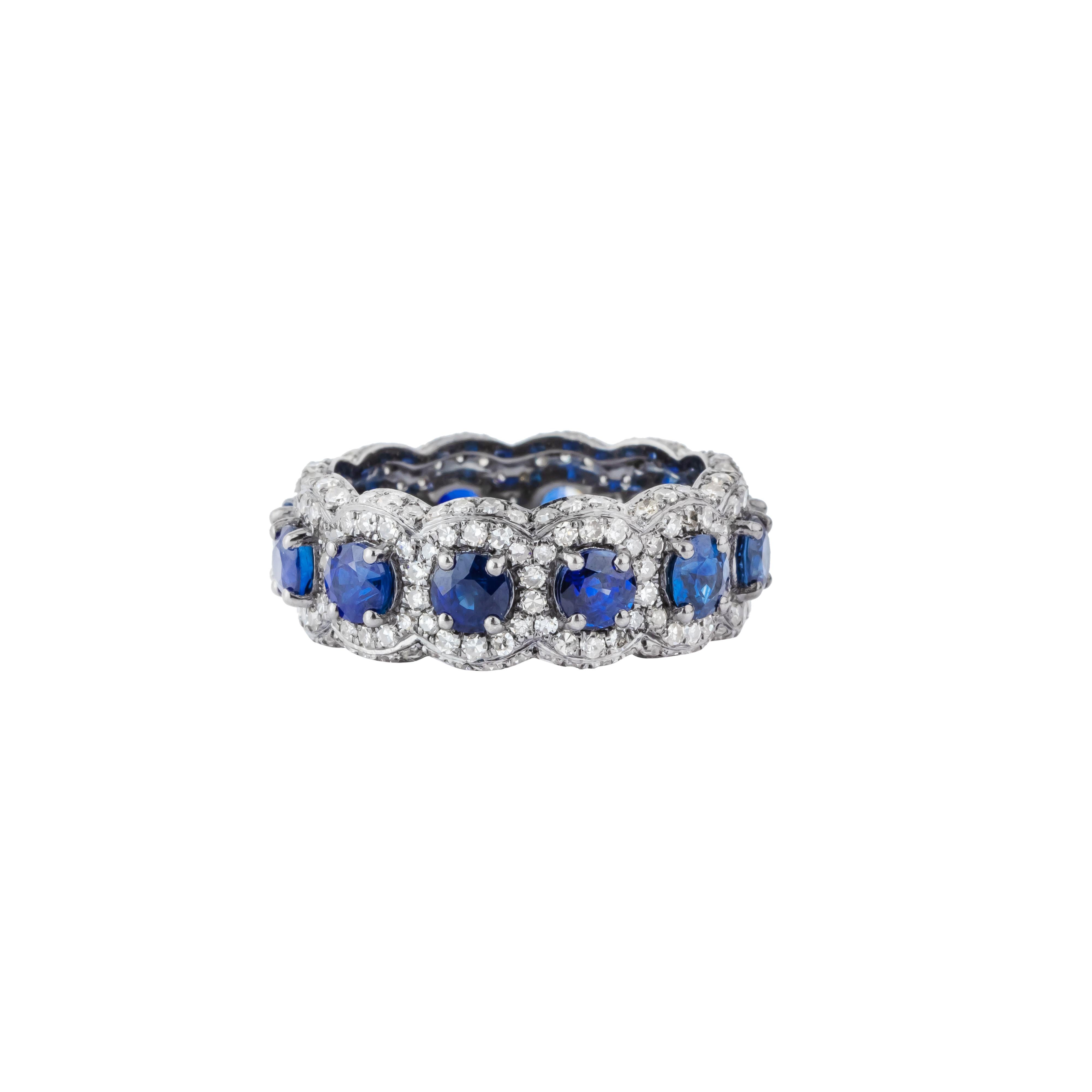 The 5.6 Carat Diamond and Sapphire Infinity Ring embodies timeless elegance and symbolic design, crafted to capture the essence of eternal beauty. This exquisite piece features an infinity motif, gracefully intertwining dazzling diamonds and vivid