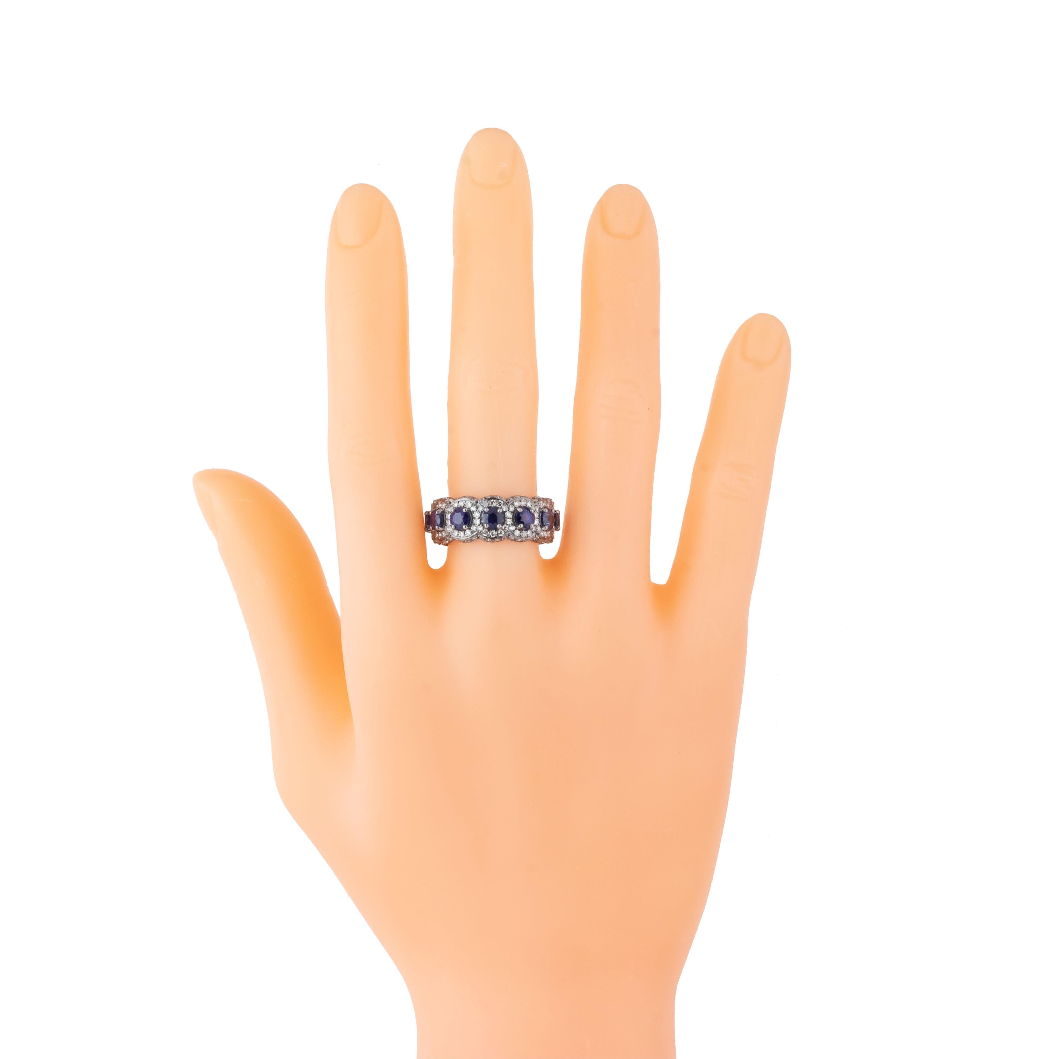 Contemporary 5.6 Carat Diamond and Sapphire Infinity Ring For Sale