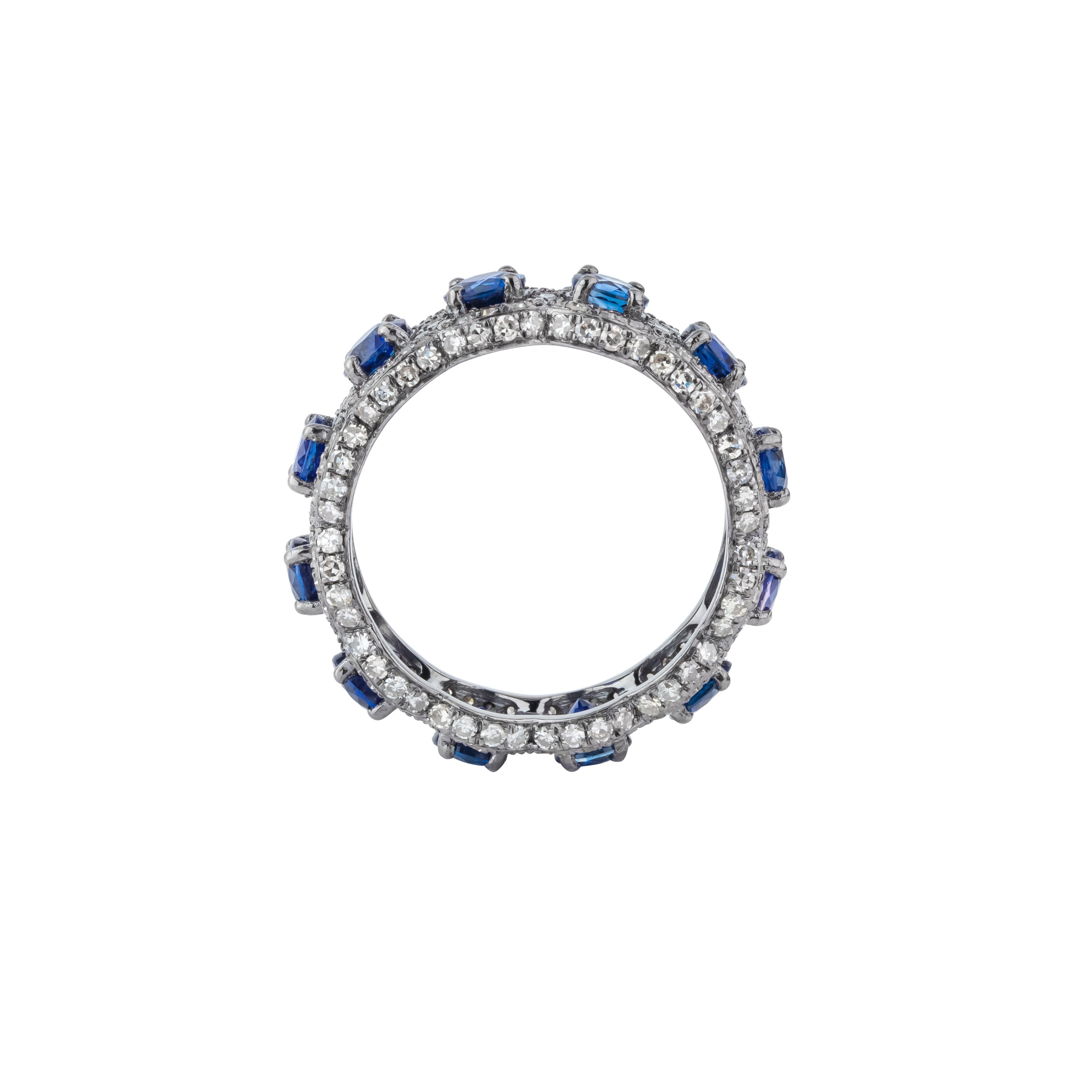 Round Cut 5.6 Carat Diamond and Sapphire Infinity Ring For Sale