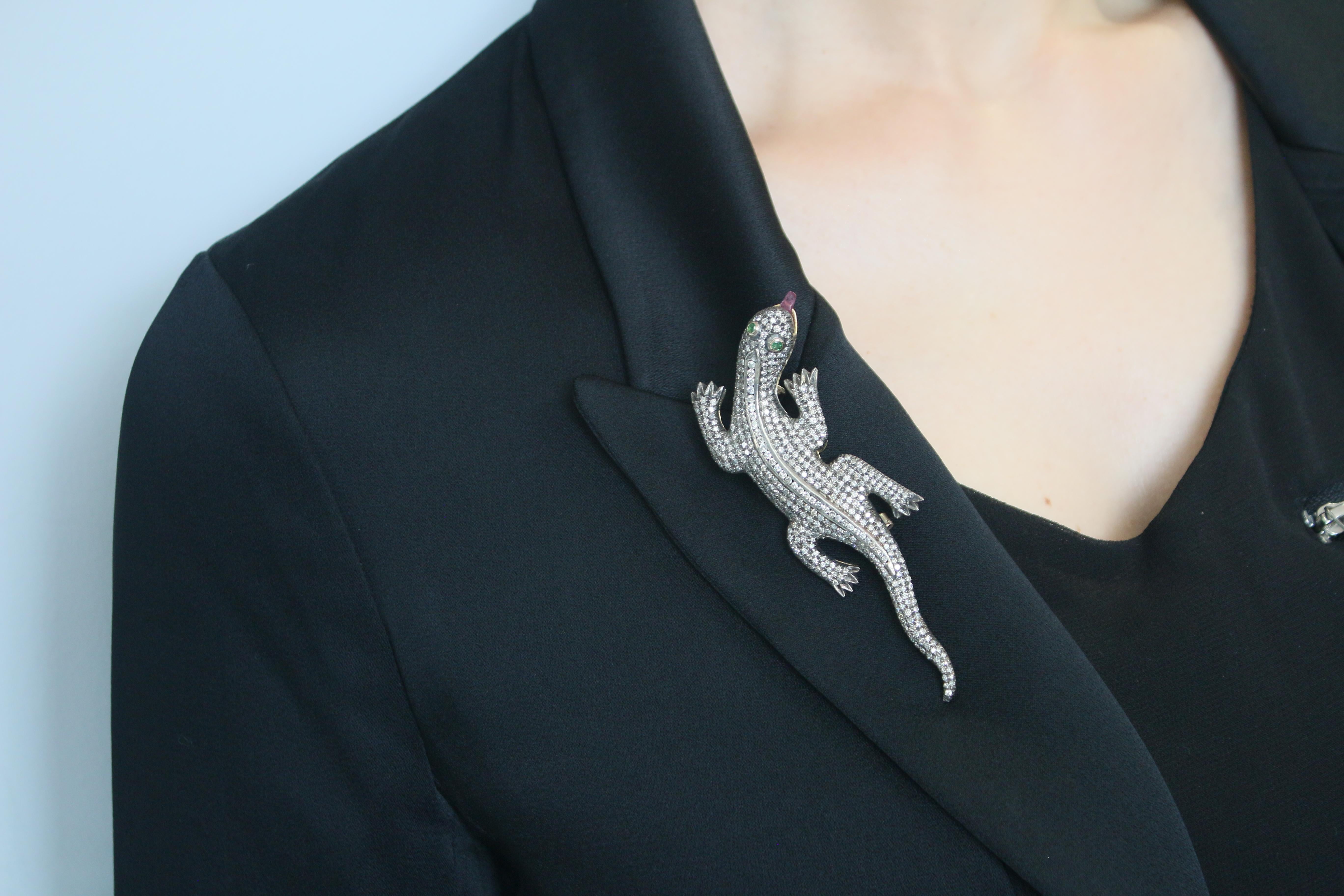 Introducing our exquisite Lizard Pin, a captivating and meticulously crafted piece that embodies the perfect blend of elegance and whimsy. This charming lizard pin is adorned with stunning diamonds and crafted in 18K gold, making it a unique and