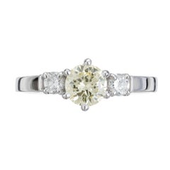.56 Carat Round Fancy Light Yellow Diamond Three-Stone Gold Engagement Ring