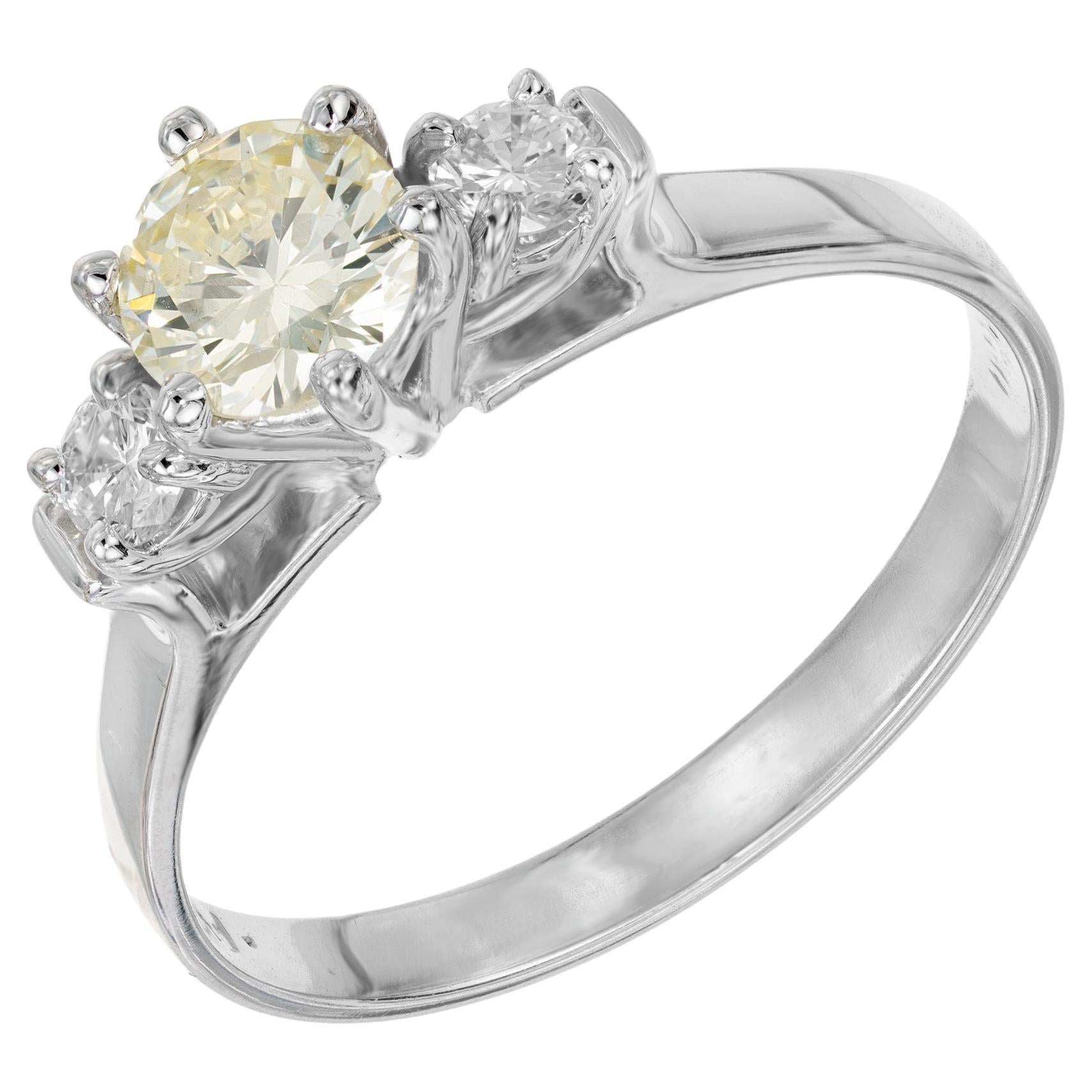 .56 Carat Round Fancy Light Yellow Diamond Three-Stone Gold Engagement Ring