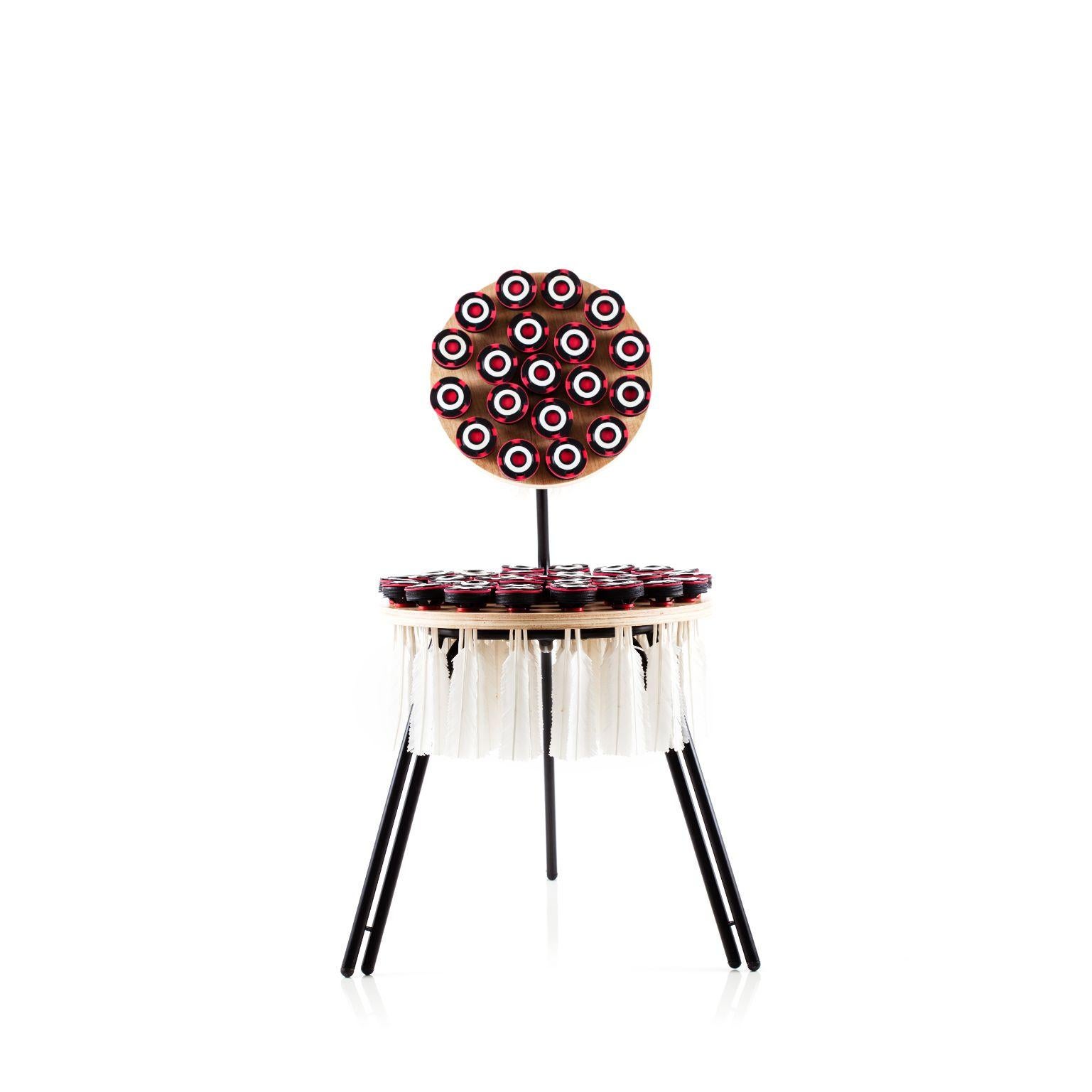 56 Petacas - Chair by Cultivado Em Casa
Dimensions: 50 x 75 x 83 cm
Materials: Carbon steel, plywood and shuttlecock.

The history of shuttlecock is genuinely Brazilian. Name given to both the sport and the artifact, shuttlecock has indigenous