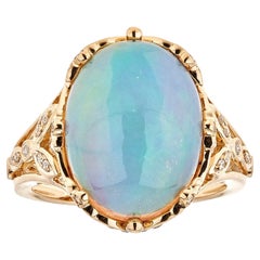 5.60 Carat Ethiopian Opal Oval Cab Diamond Accents 14K Yellow Gold Ring