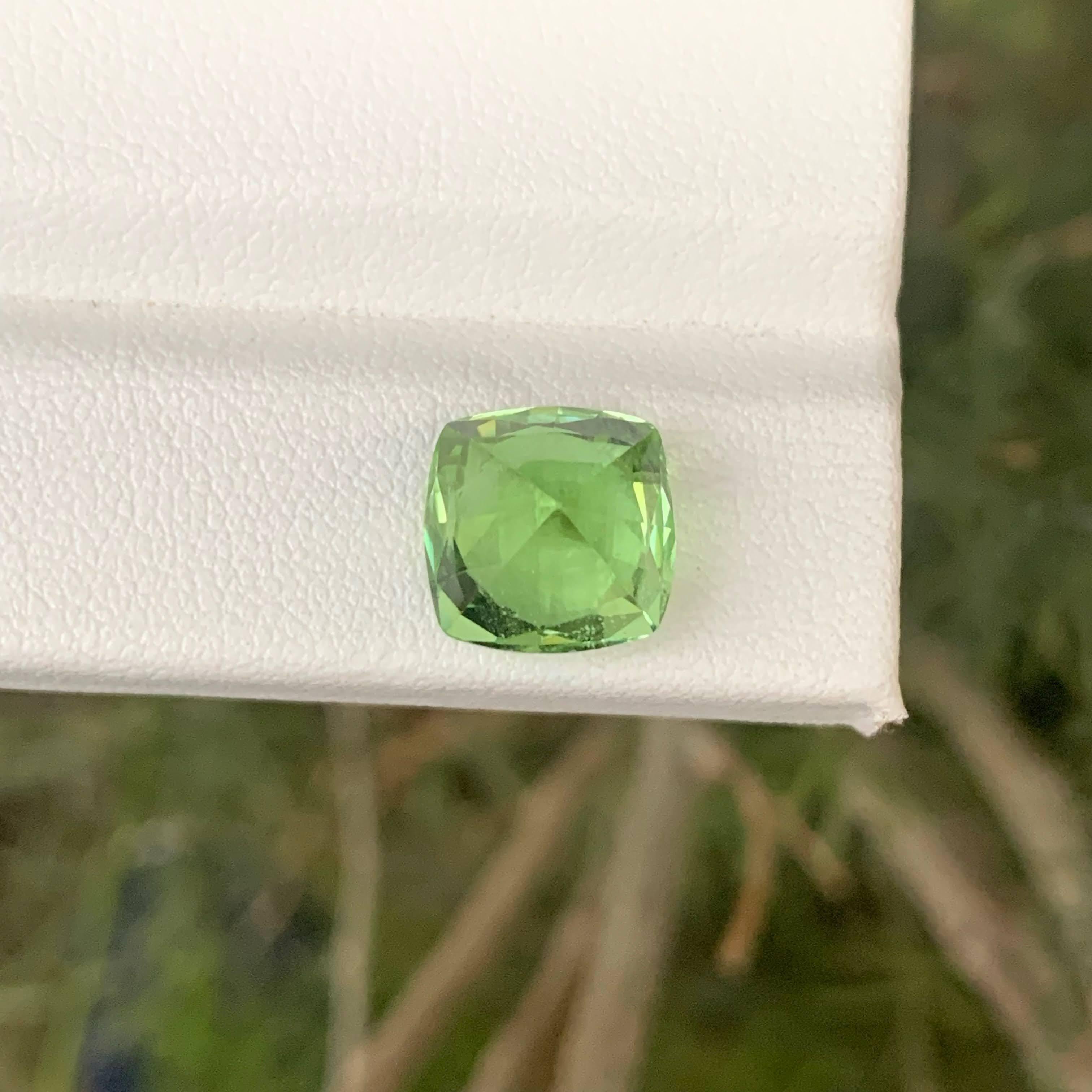 Modern 5.60 Carat Natural Loose Green Peridot Stone Cushion Cut Pakistani Gemstone For Sale