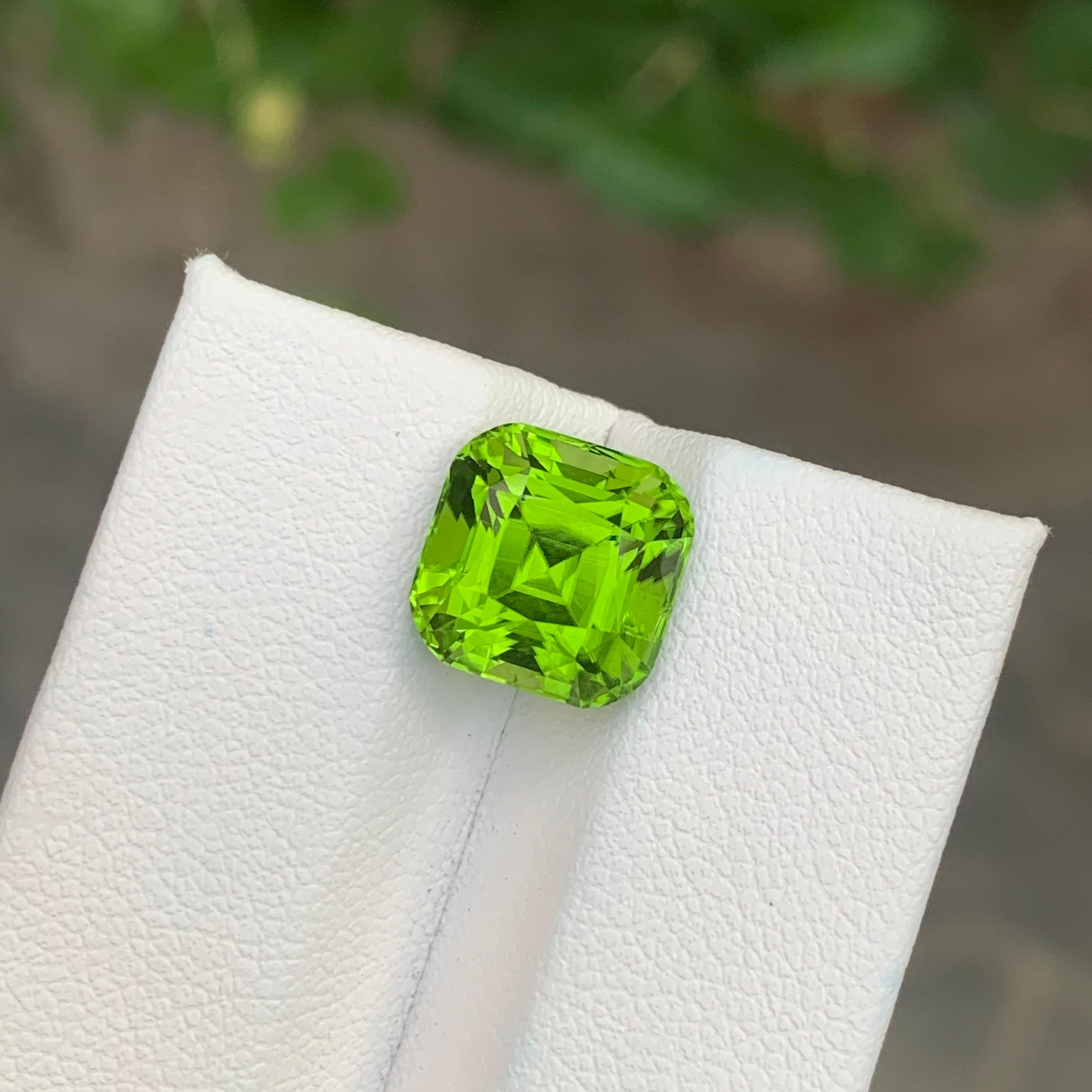 Women's or Men's 5.60 Carat Natural Loose Peridot Cushion Shape Gemstone For Sale