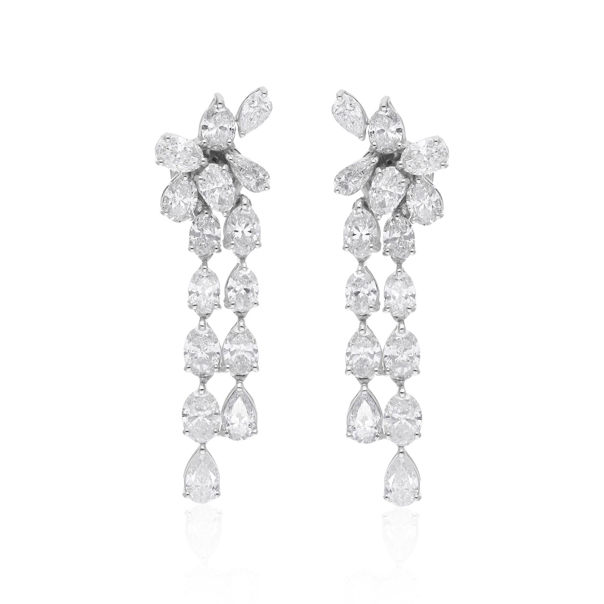 The centerpiece of each earring is a dazzling oval-cut diamond, exuding timeless charm and enchanting sparkle. These magnificent stones are carefully selected for their exceptional quality, radiance, and fire, ensuring that they catch and reflect