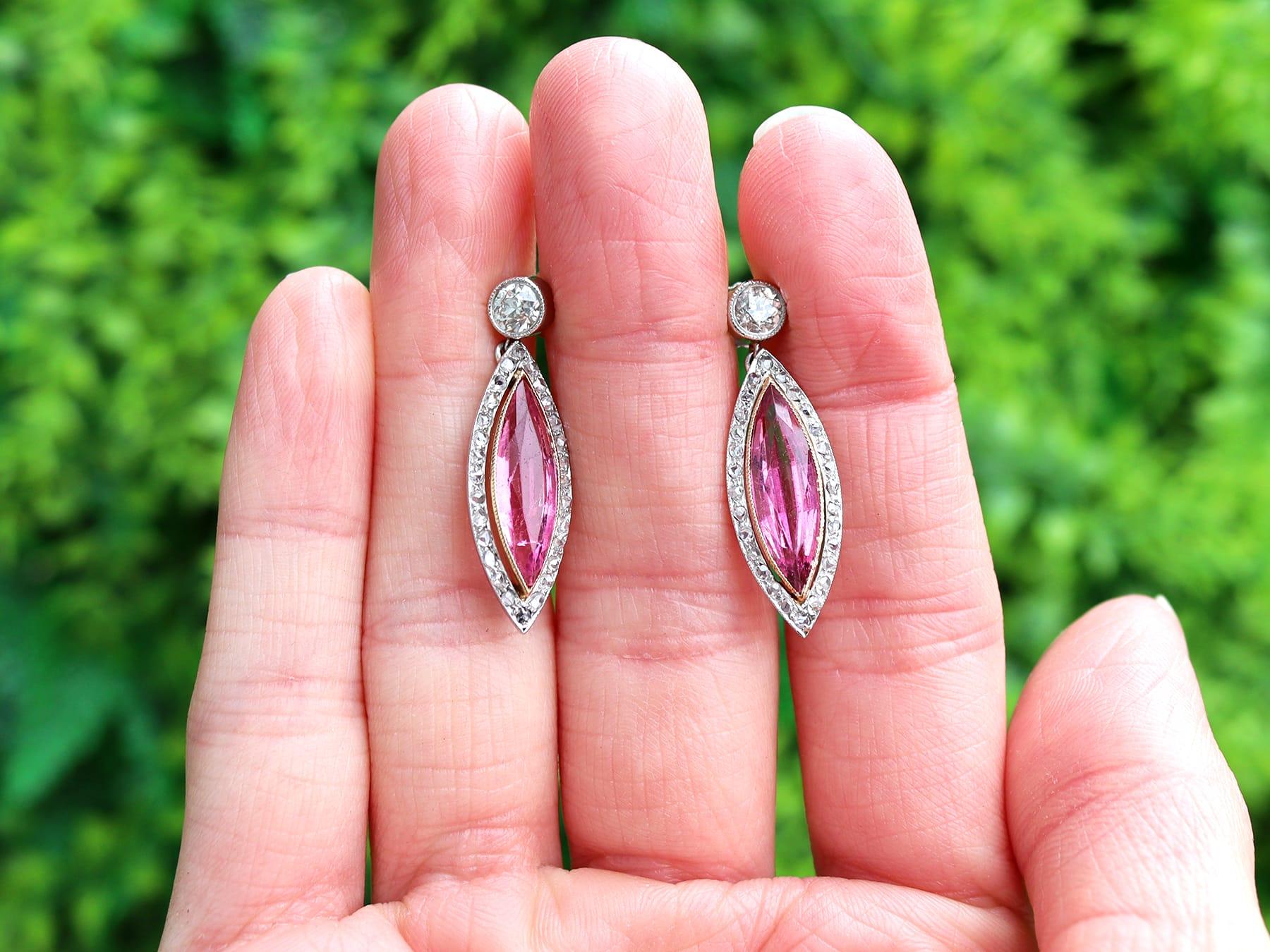 A stunning, fine and impressive pair of antique 5.60 carat pink tourmaline, 1.10 carat diamond, platinum and 18 karat yellow gold set earrings; part of our diverse drop earrings collection.

These stunning, fine and impressive antique tourmaline
