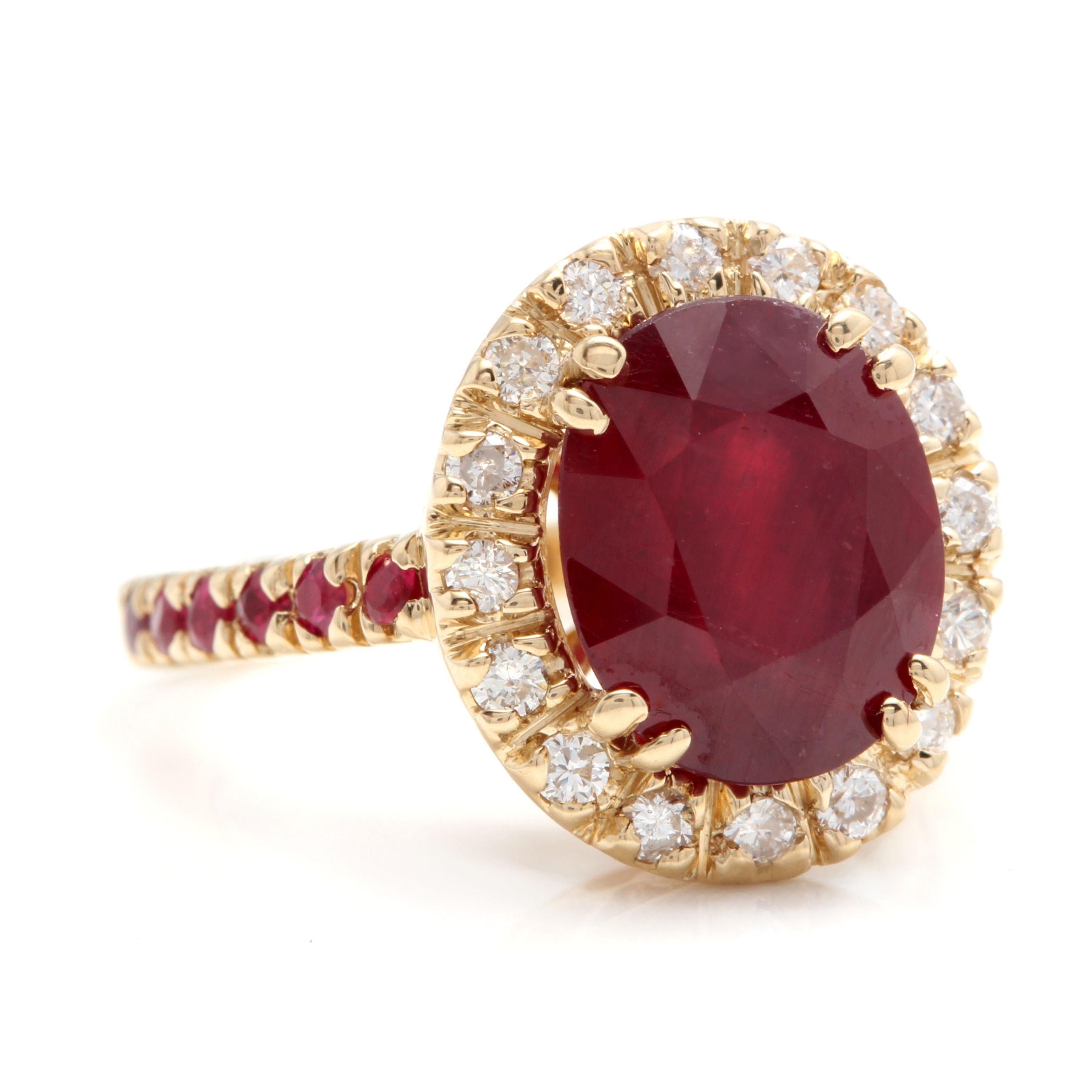 5.60 Carats Gorgeous Natural Red Ruby and Diamond 14K Solid Yellow Gold Ring

Total Natural Oval Cut Red Ruby Weight is Approx. 5.00 Carats

Center Stone Measures: 11.00 x 9.00mm

Center Ruby Treatment: Lead Glass Filling

Side Rubies are