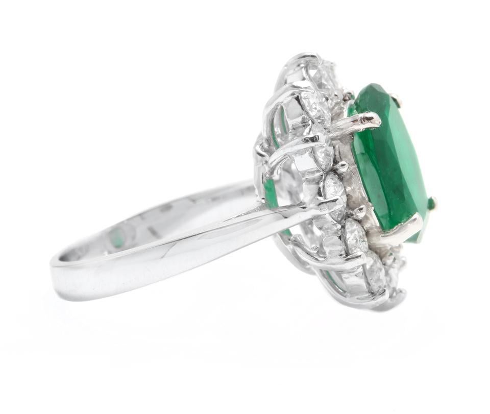 Oval Cut 5.60 Carat Natural Emerald and Diamond 14 Karat Solid White Gold Ring For Sale