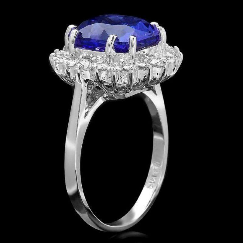 5.60 Carats Natural Very Nice Looking Tanzanite and Diamond 14K Solid White Gold Ring

Total Natural Tanzanite Weight is: Approx. 4.80 Carats 

Tanzanite Measures: Approx. 10.00 x 9.00mm

Natural Round Diamonds Weight: Approx. 0.80 Carats (color G-H