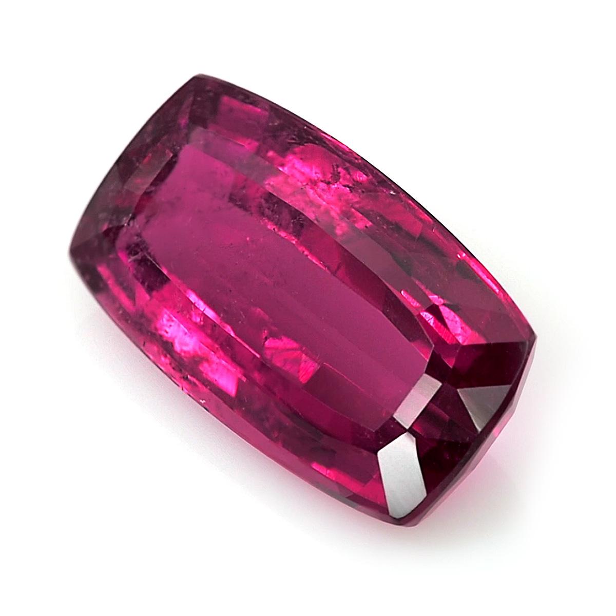 Identification: Natural Rubellite 5.60 carats

Carat: 5.60 carats
Shape: Radiant
Measurements: 15 x 8.4 x 5.12 mm 
Cut: Brilliant/Step
Color: Pink
Clarity: very eye clean

Presenting a striking Natural Rubellite, weighing 5.60 carats and skillfully
