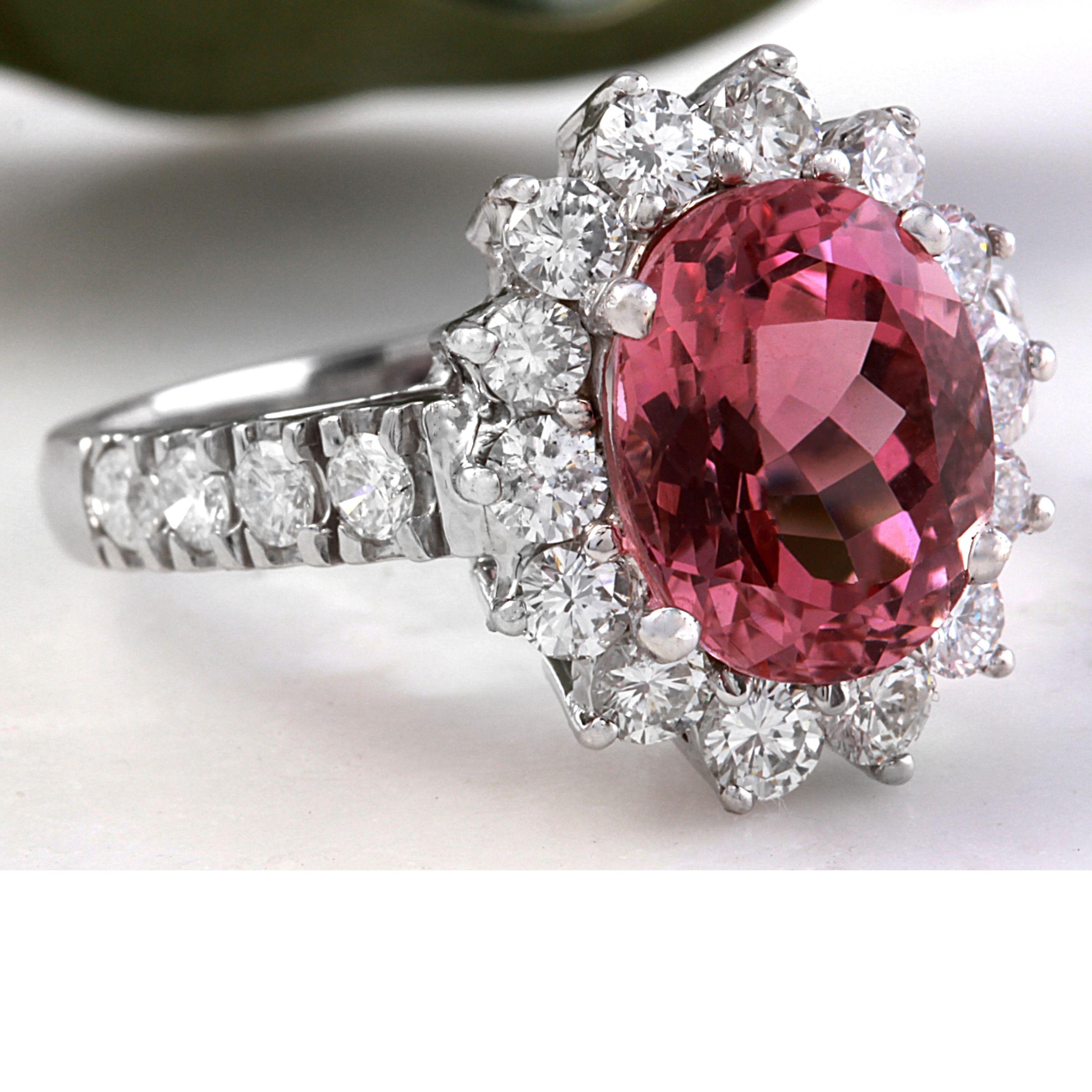 5.60 Carats Natural Very Nice Looking Tourmaline and Diamond 14K Solid White Gold Ring

Total Natural Oval Cut Tourmaline Weight is: Approx. 4.50 Carats (Treatment-Heat)

Tourmaline Measures: Approx. 11.00 x 9.00mm

Natural Round Diamonds Weight: