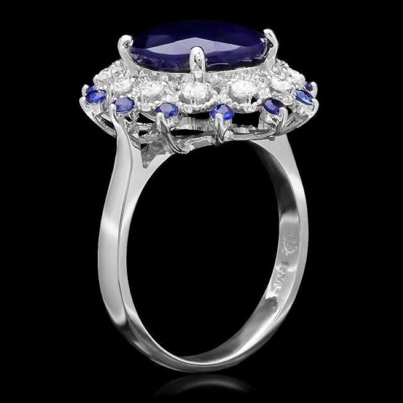 5.60 Carats Exquisite Natural Blue Sapphire and Diamond 14K Solid White Gold Ring

Total Blue Sapphire Weight is: Approx. 5.30 Carats

Sapphire Measures: Approx. 11.00 x 9.00mm (Oval Sapphire)

Sapphire Measures: Approx. 2.0 mm (Round