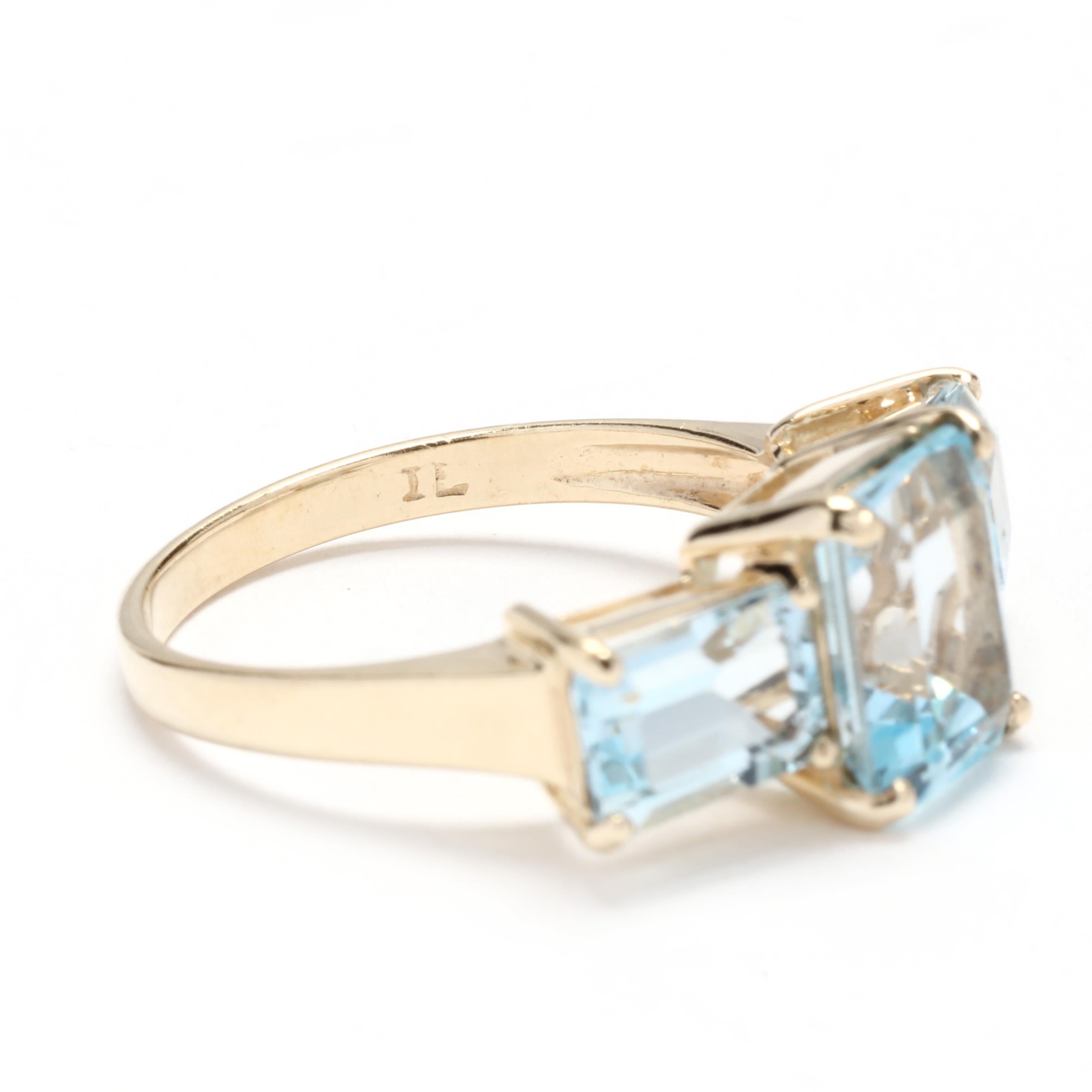 5.60ctw Emerald Cut Blue Topaz Three Stone Ring, 10Kt Yellow Gold 2