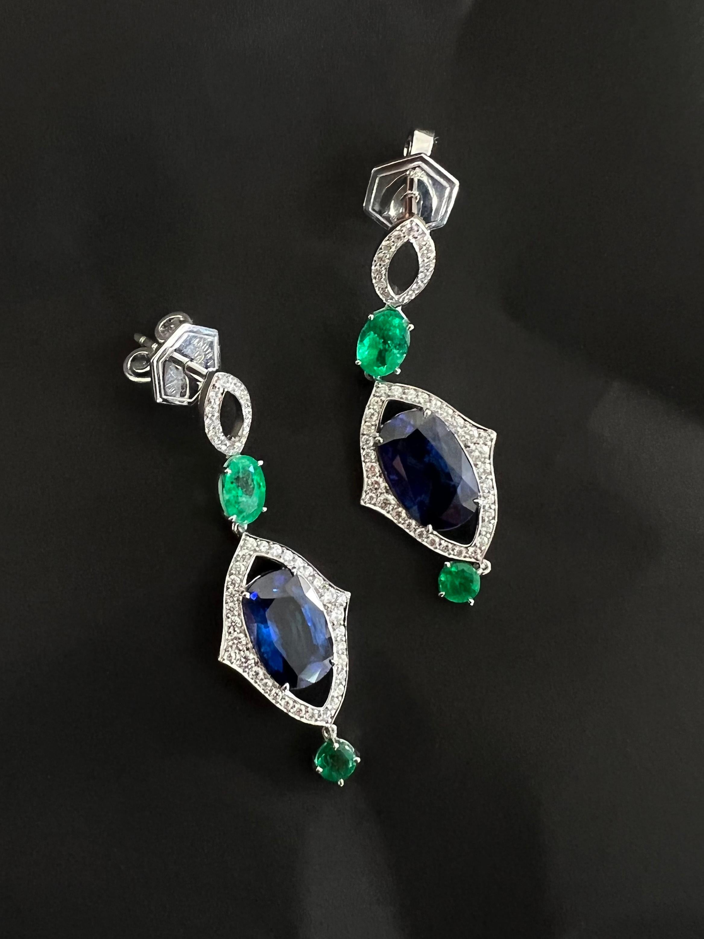 Modern 5.61 Carat Blue Sapphire and 1.20 Carat Emerald Earrings in 18K White Gold For Sale