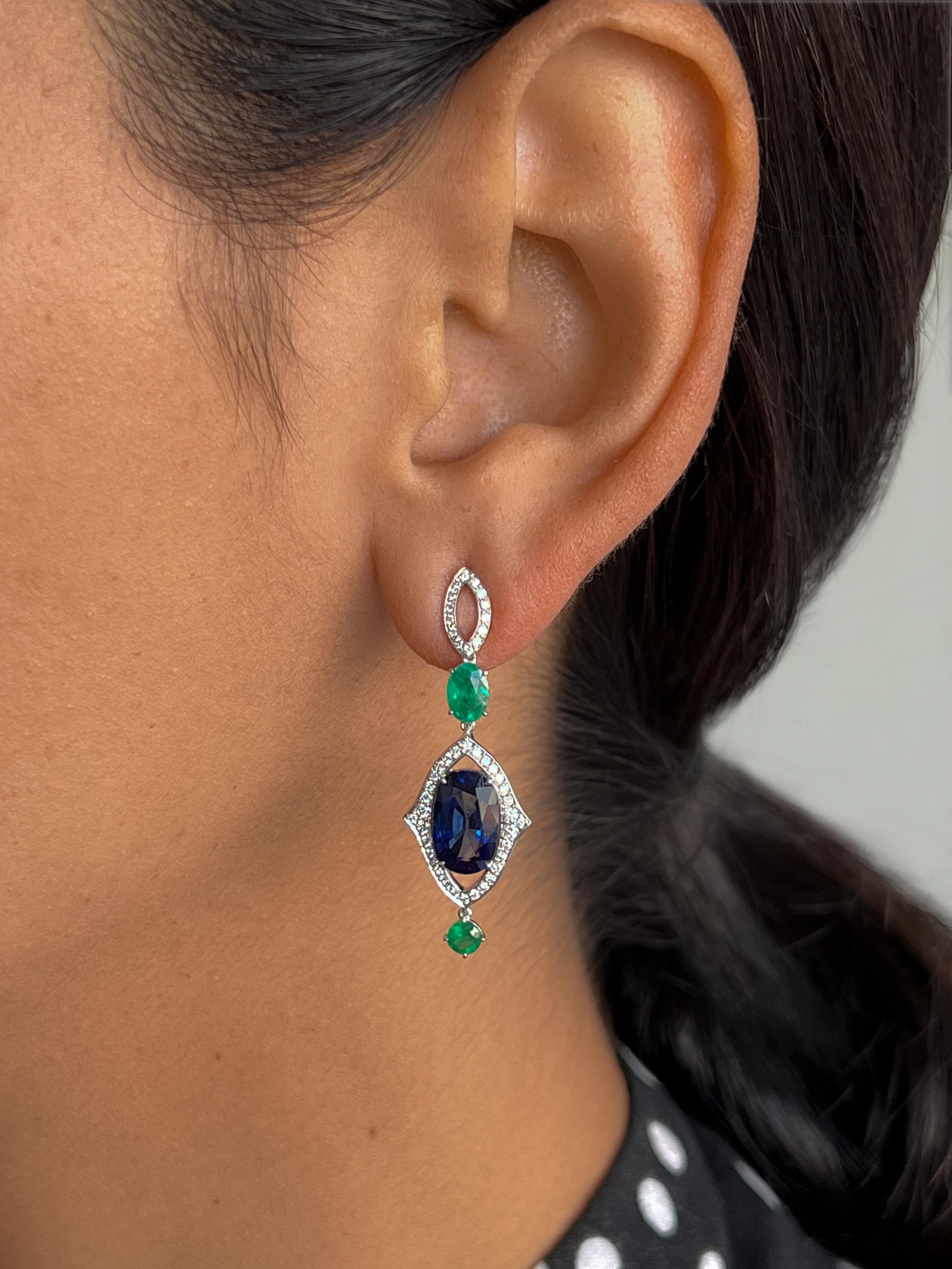 Oval Cut 5.61 Carat Blue Sapphire and 1.20 Carat Emerald Earrings in 18K White Gold For Sale