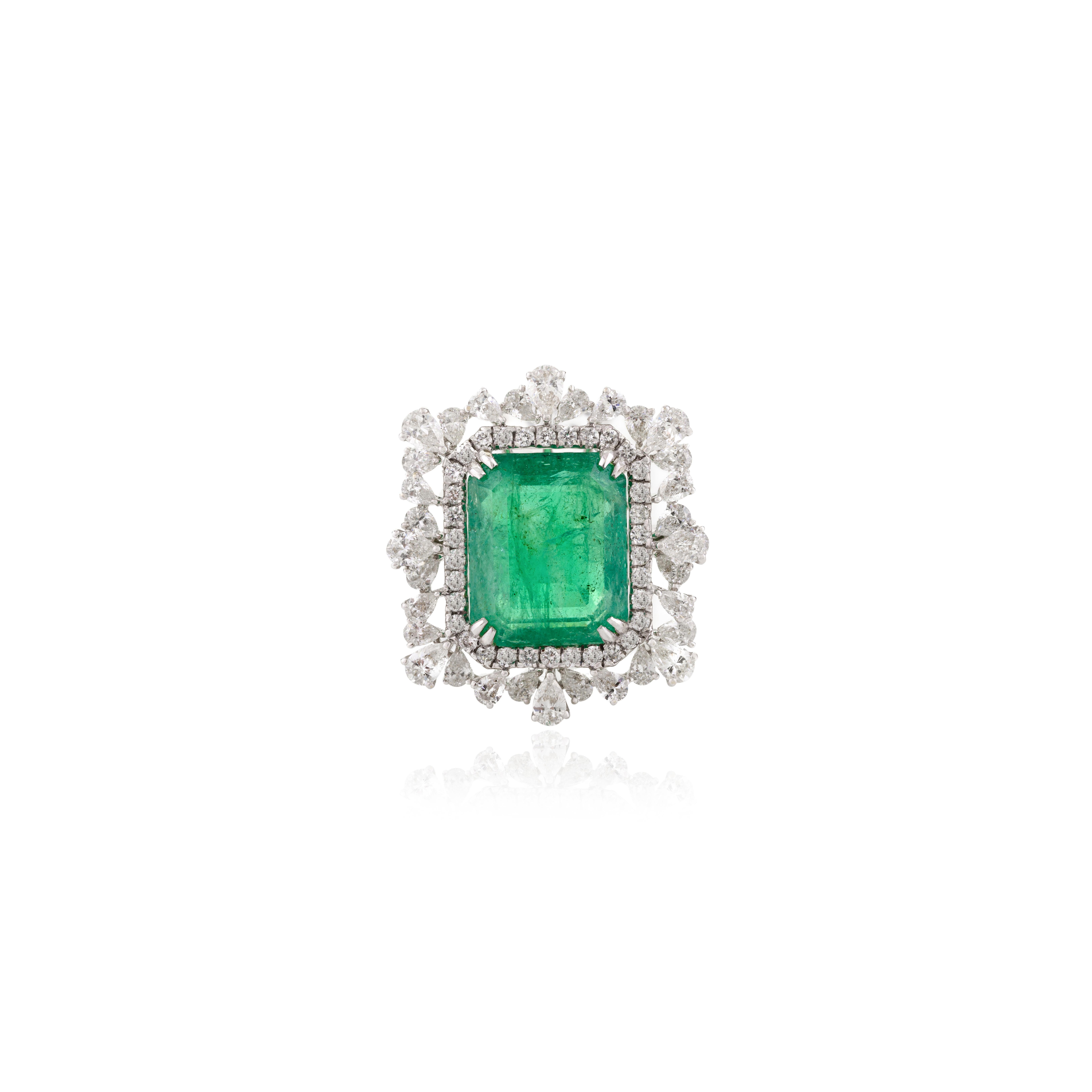 For Sale:  5.61 CTW Zimbabwe Emerald Cocktail Ring with Halo Diamonds in 18k White Gold 7