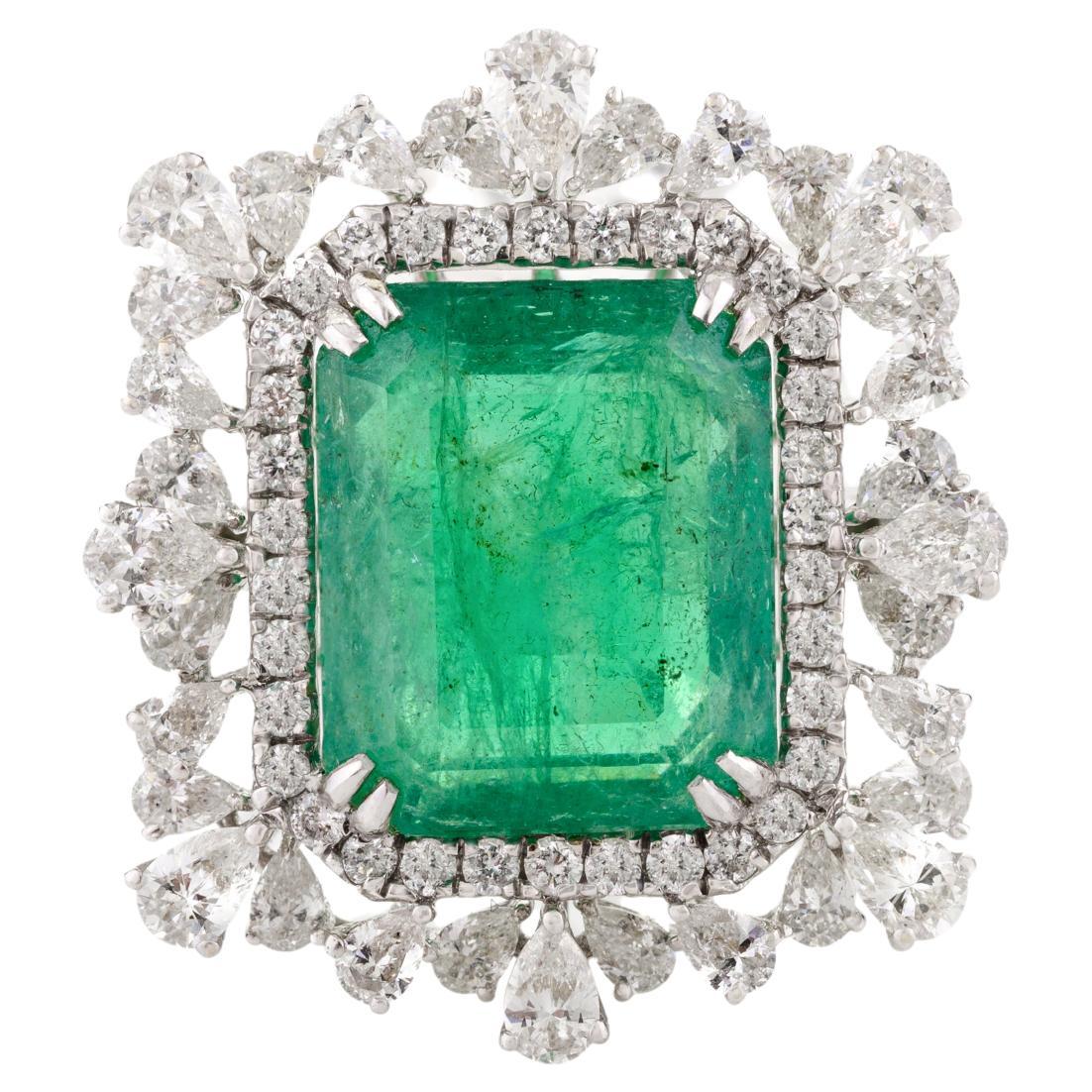For Sale:  5.61 CTW Zimbabwe Emerald Cocktail Ring with Halo Diamonds in 18k White Gold