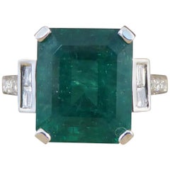 5.62 Carat Emerald Cut Medium Colored Emerald and Diamond Ring in 18 Carat Gold