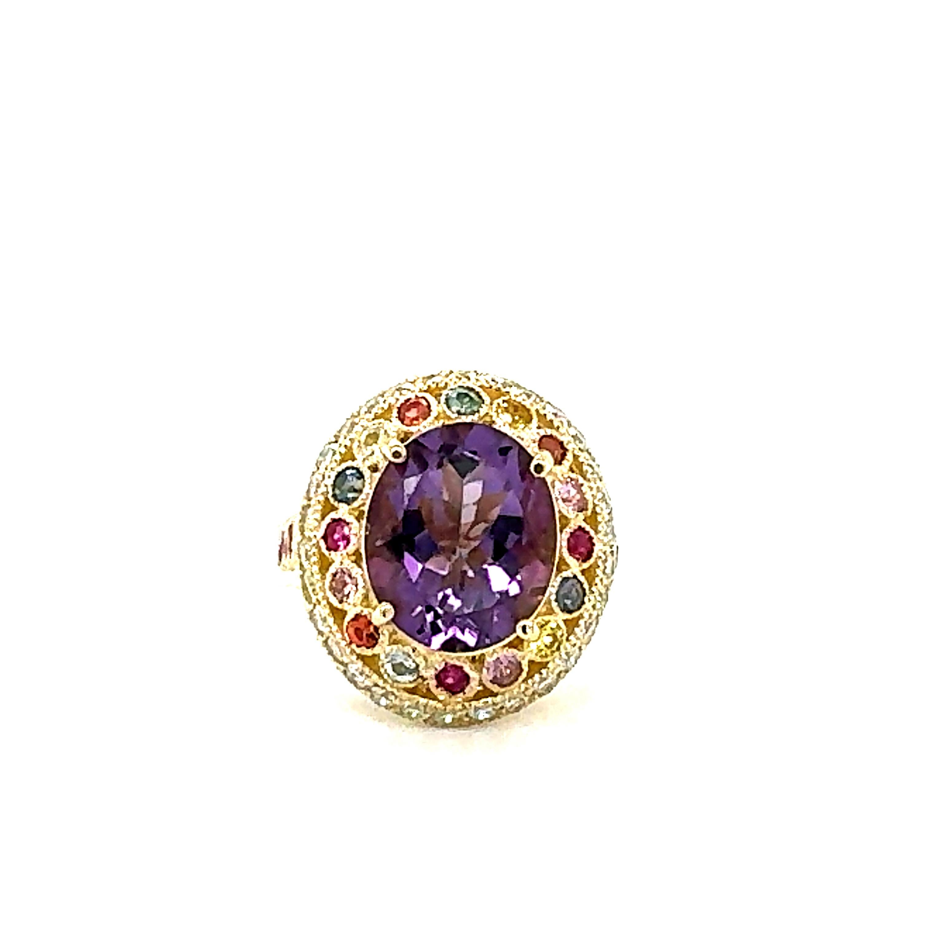 5.62 Carat Natural Amethyst Diamond Sapphire Yellow Gold Cocktail Ring

This ring has a bright and vivid purple Oval Cut Amethyst that weighs 4.00 Carats and is embellished with 22 Multi-Color Sapphires that weigh 0.95 Carats as well as 30 Round Cut