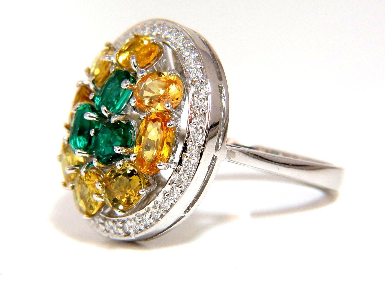 Natural Yellow Sapphires & emeralds diamonds cluster ring.

Raised dome.

Sapphires & Emeralds: 5.12ct

Full cut brilliant ovals

 supreme Clean clarity 

Transparent and vibrant top Bright gem Fancy yellow colors sapphires & 

Bright green