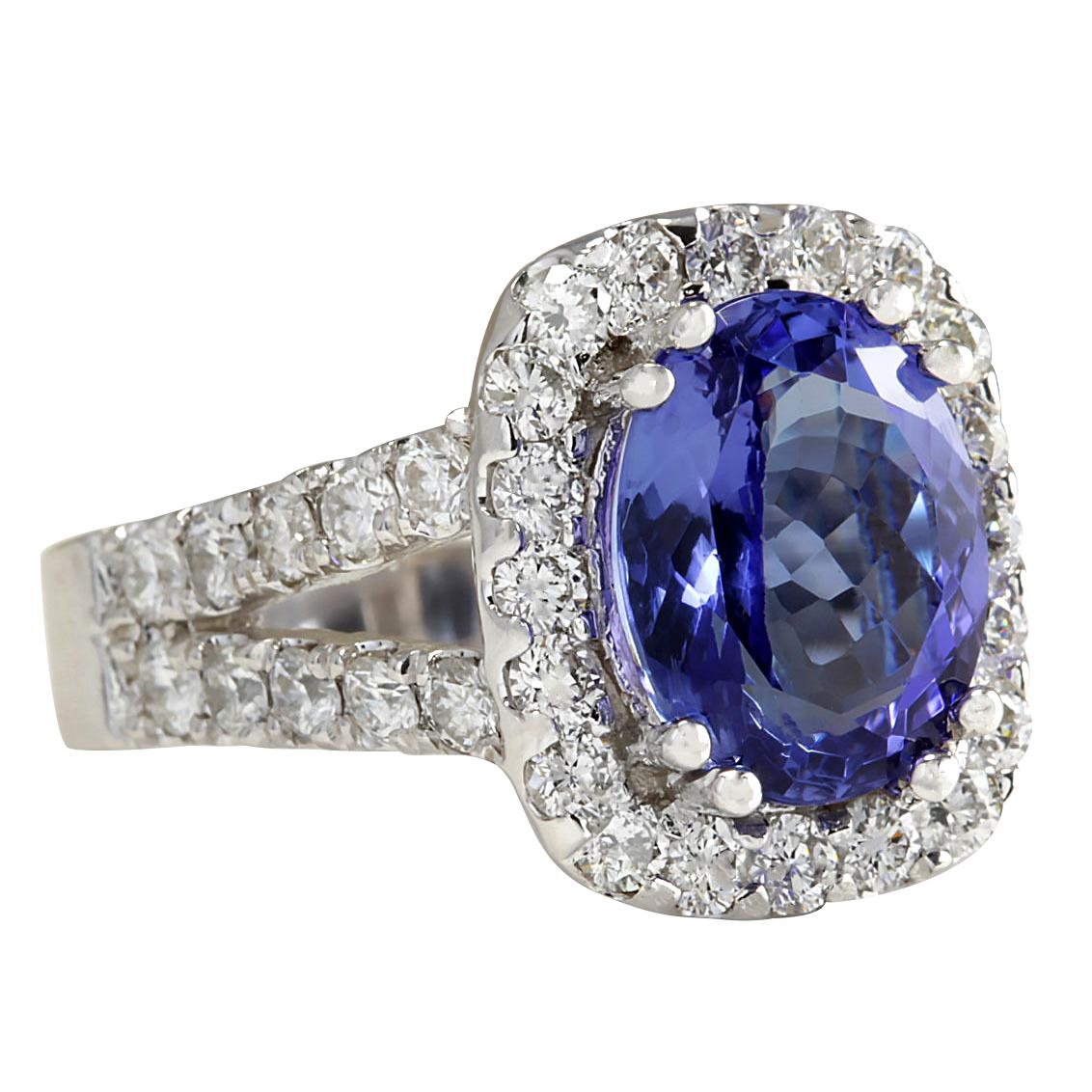 5.62 Carat Tanzanite 14 Karat White Gold Diamond Ring
Stamped: 14K White Gold
Total Ring Weight: 9.0 Grams
Total  Tanzanite Weight is 4.02 Carat (Measures: 11.00x9.00 mm)
Color: Blue
Total  Diamond Weight is 1.60 Carat
Color: F-G, Clarity: