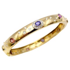 Vintage 5.62 Carat Total Multi-Colored Sapphire and Diamond Yellow Gold Bangle Bracelet