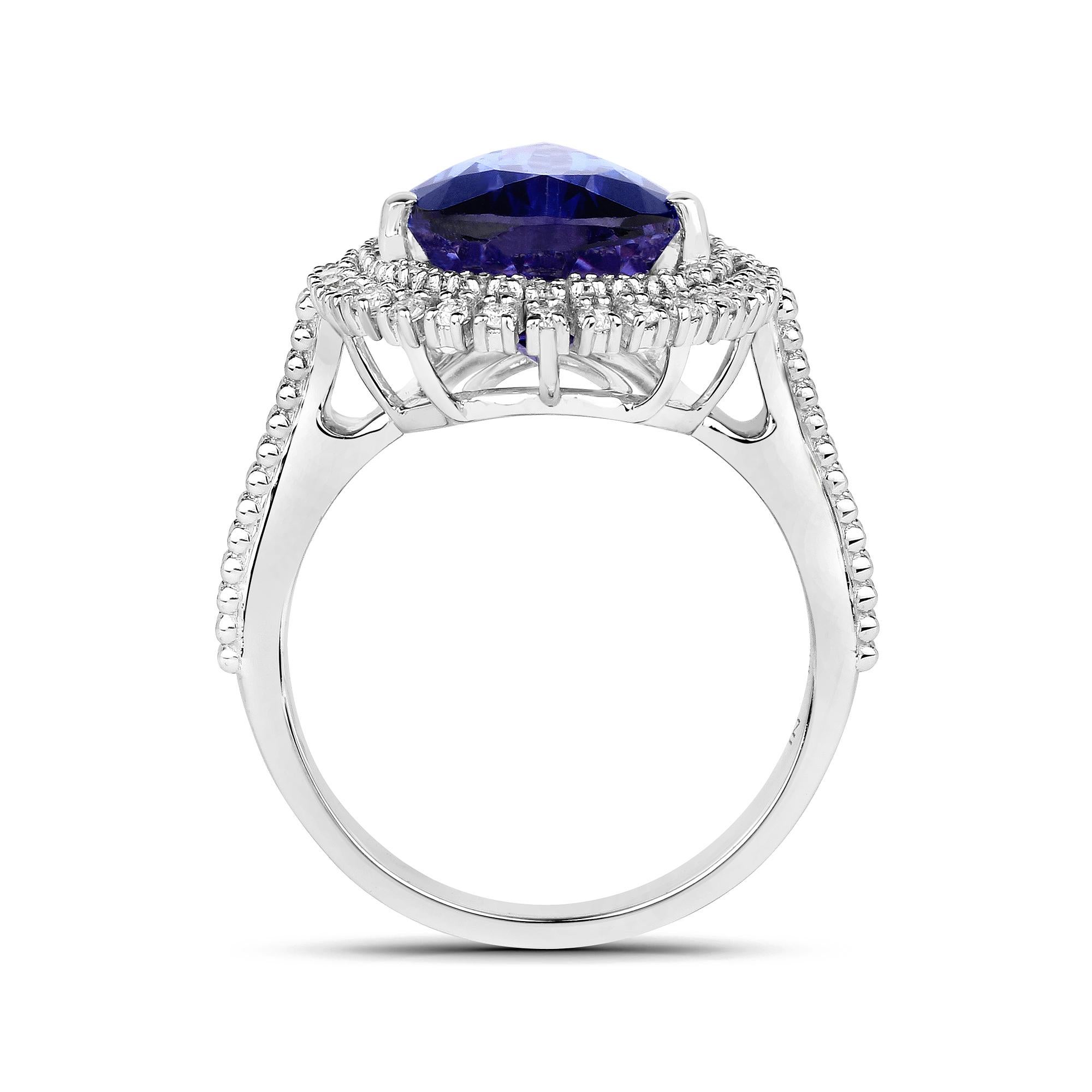 Contemporary 5.63 Carat Genuine Tanzanite and White Diamond 14 Karat White Gold Cocktail Ring For Sale