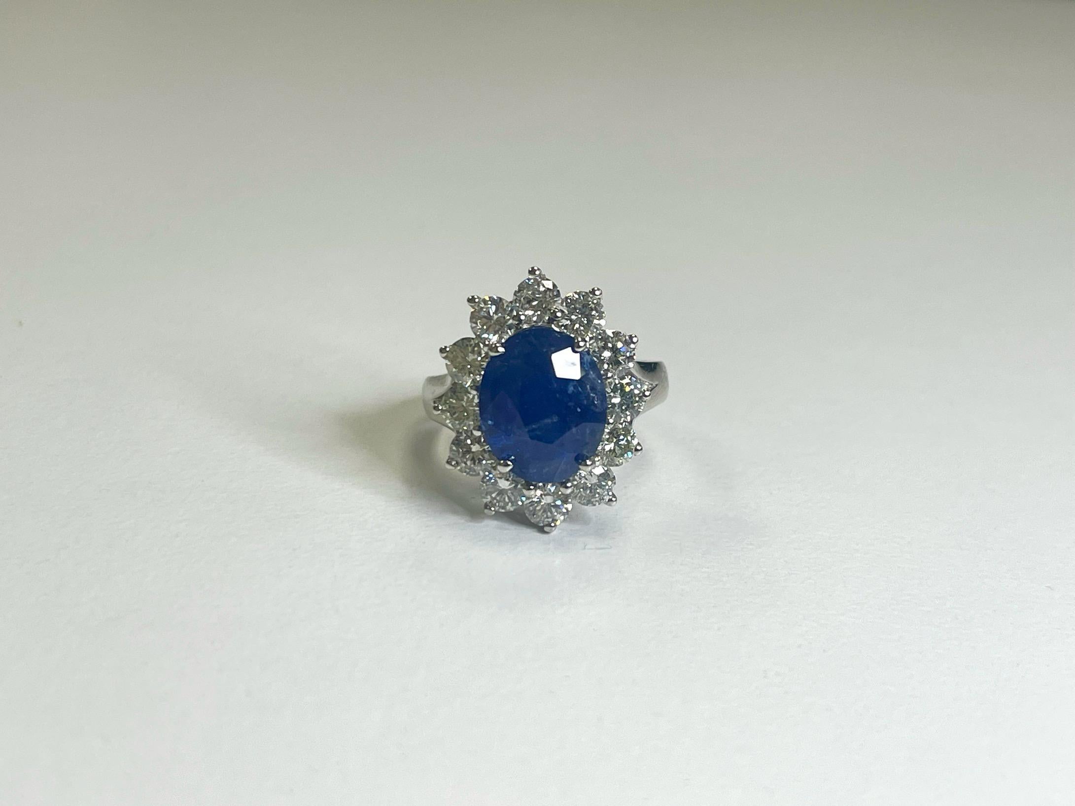 Beautiful Natural Sapphire and Natural Diamond adorned 14K White Gold Ring in size 6.

Center stone: natural 5.63 carats sapphire (heat only)
secondary stone: 2.16 carats natural diamonds, 13 pieces

8.14 grams, average G-H, VVS

*Free shipping