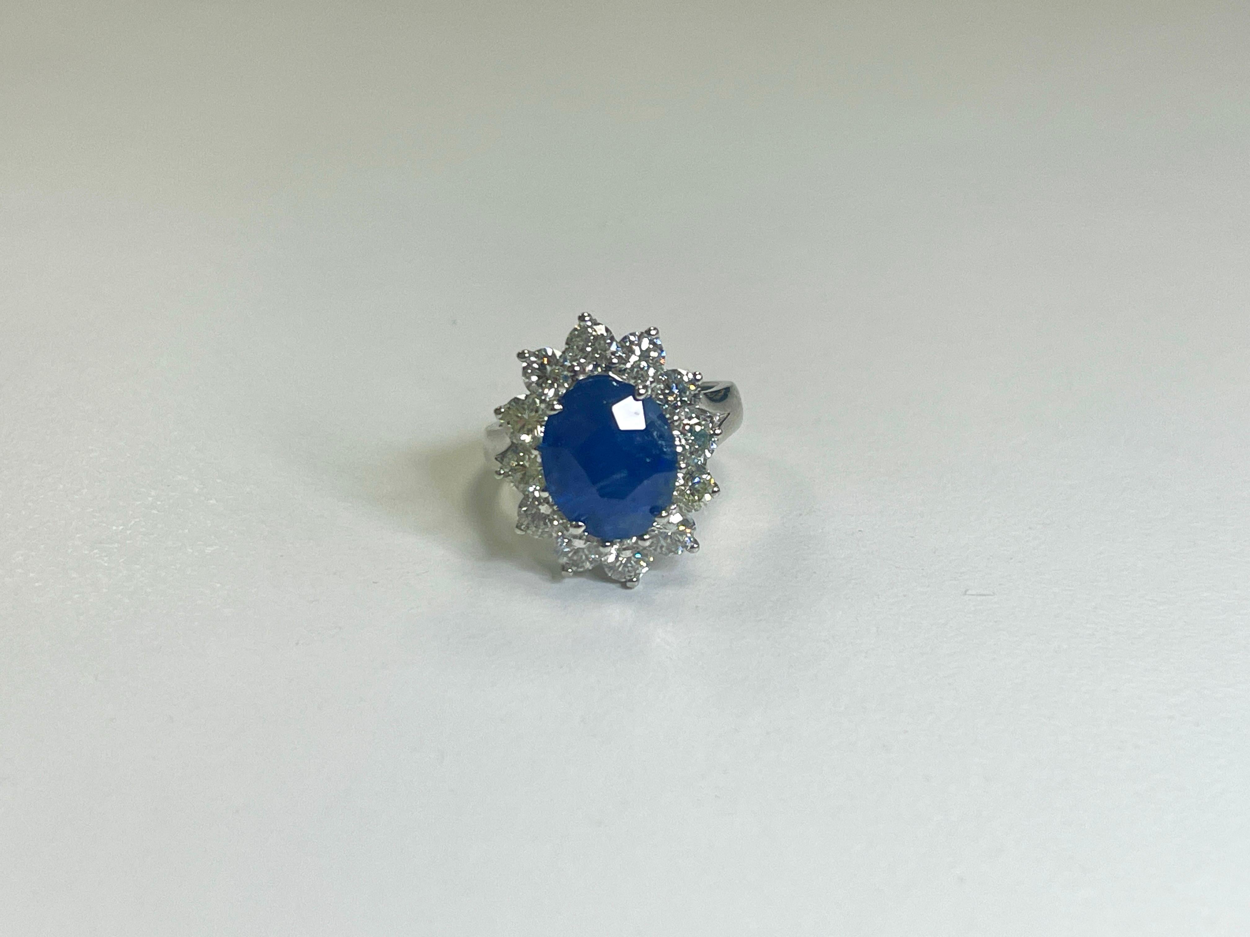 Oval Cut 5.63 Carat Natural Sapphire and All Natural Diamonds 14K White Gold Ring For Sale
