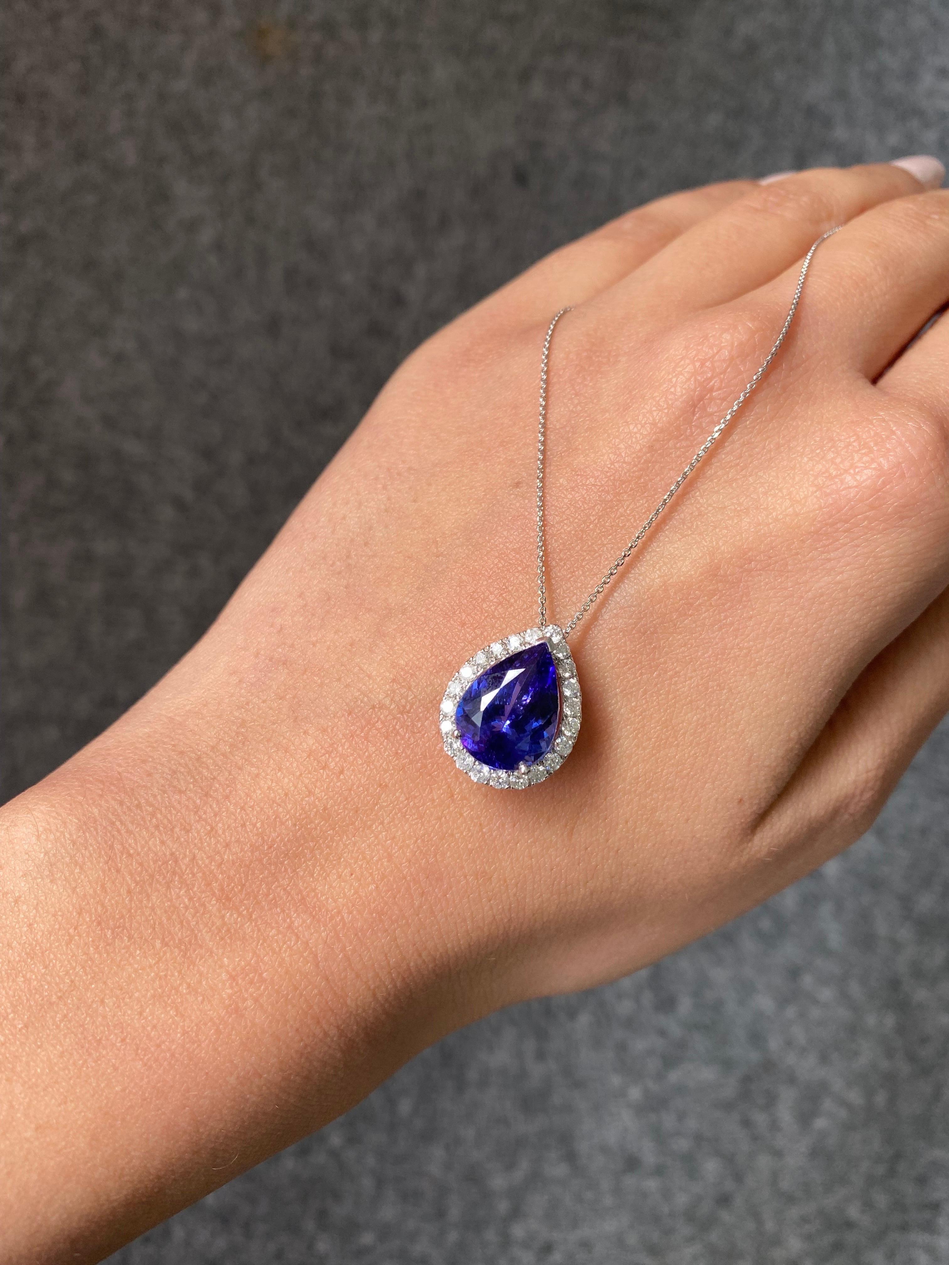 Modern 5.63 Carat Pear Shape Tanzanite and Diamond Pendant For Sale