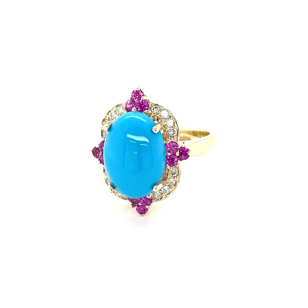 Taille ovale Bague cocktail en or jaune avec turquoise de 5,63 carats et saphirs roses en vente