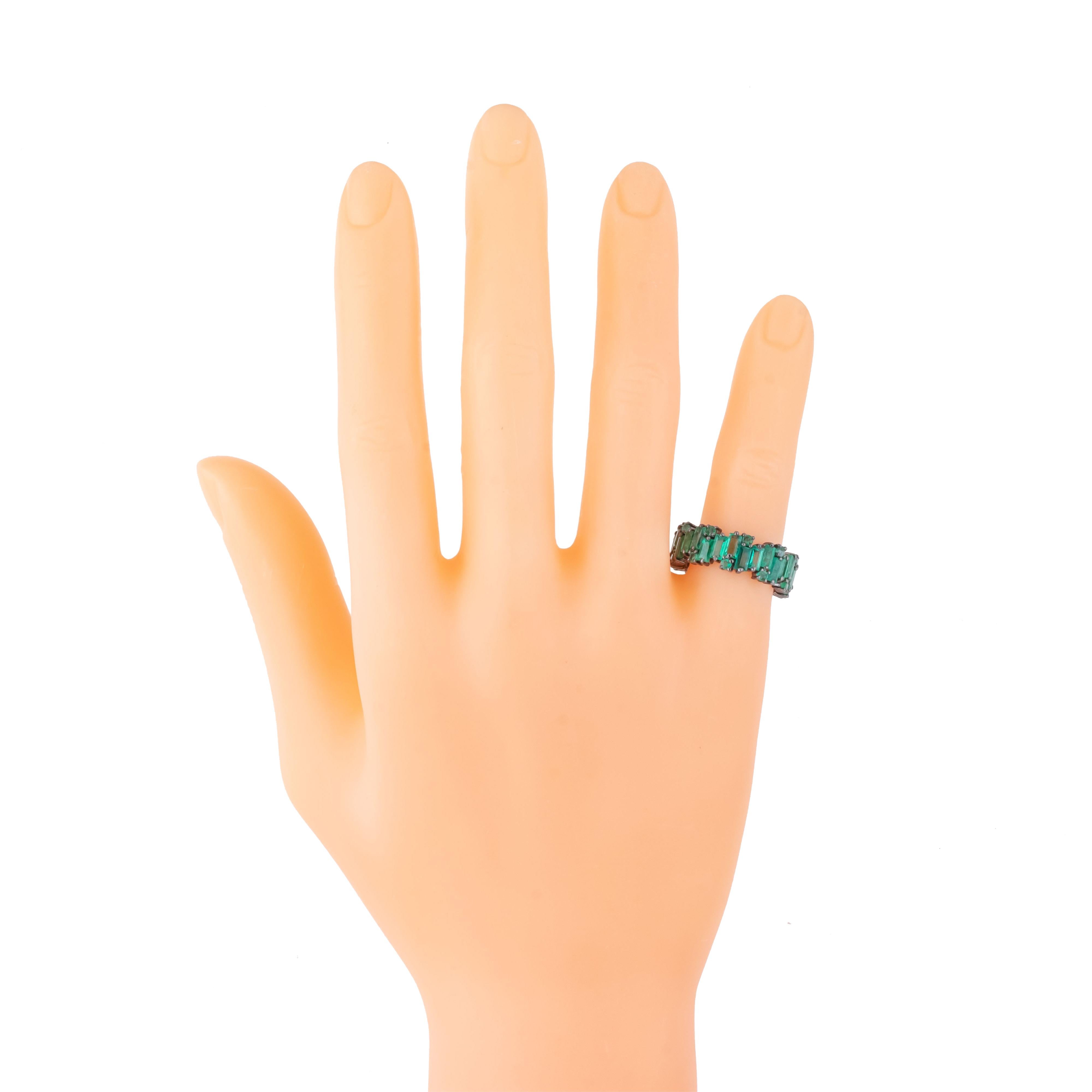 Contemporary 5.65 Carat Emerald Infinity Band Ring For Sale