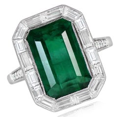 5.65 Carat Emerald Ring, with Diamond Halo