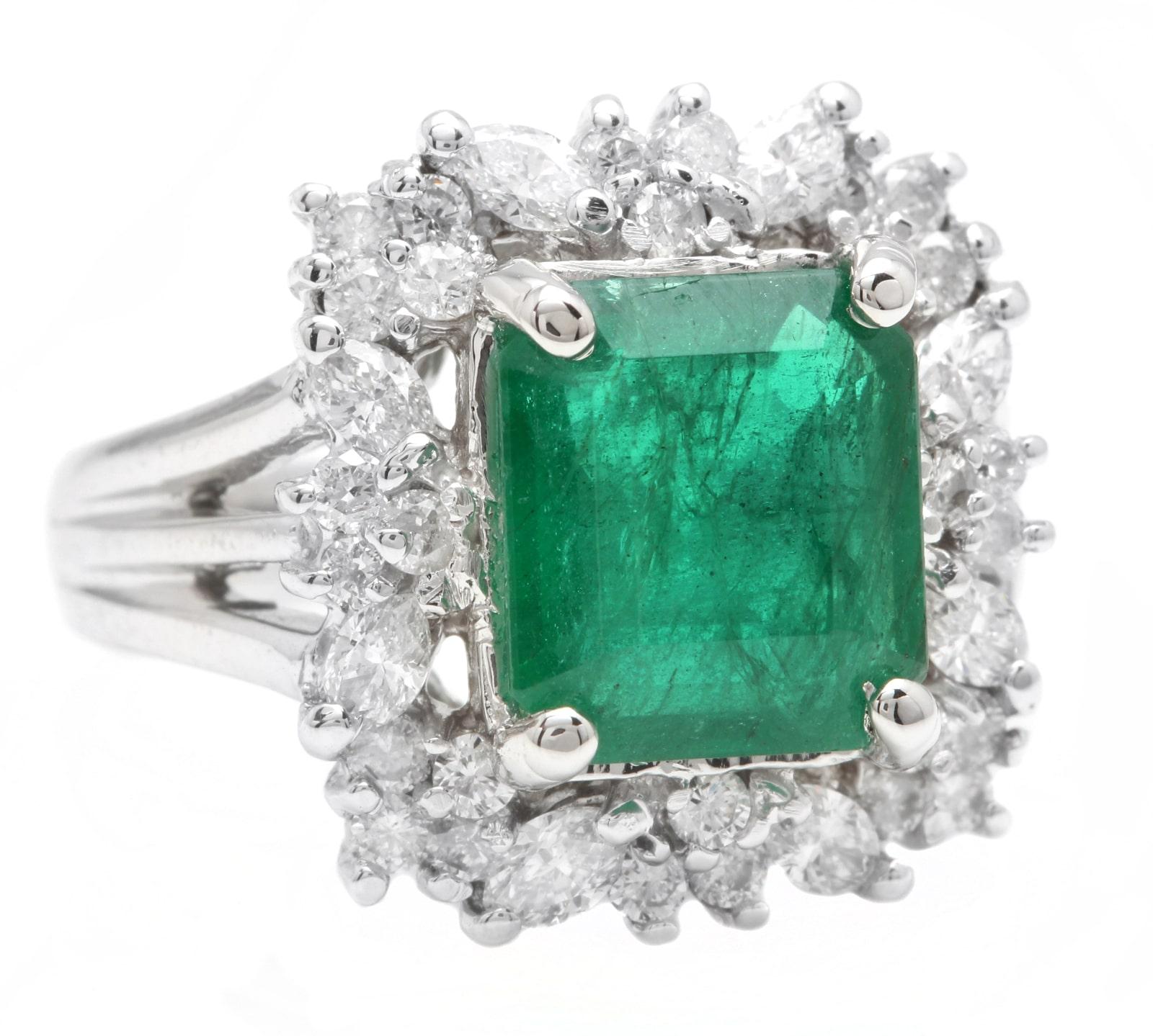 5.65 Carats Natural Emerald and Diamond 14K Solid White Gold Ring

Suggested Replacement Value: US$7000.00

Center Emerald Cut Emerald Weight is: Approx. 4.50Ct (transparent)

Emerald Treatment: Oiling

Center Emerald Measures: Approx. 12 x