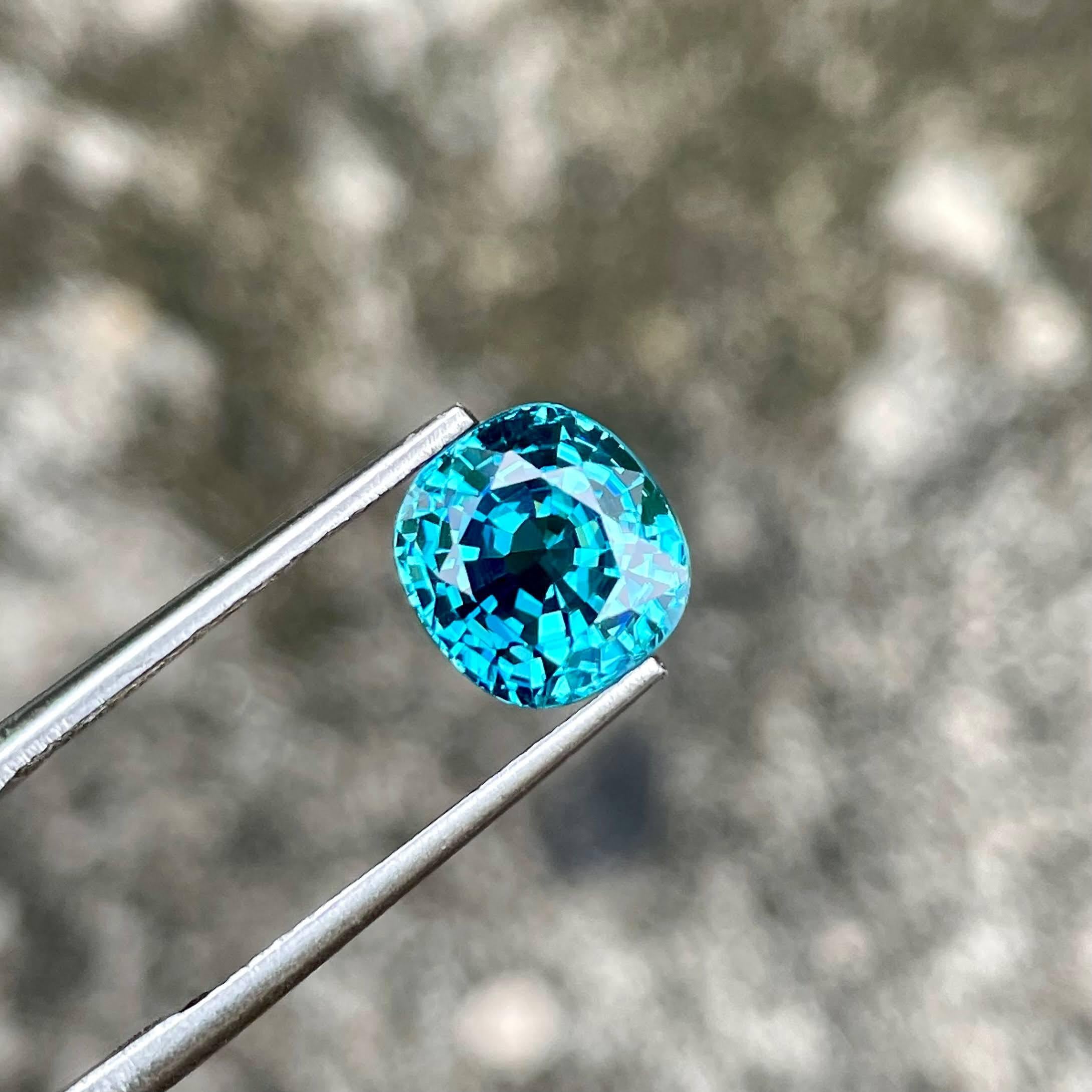Weight 5.65 carats 
Dimensions 8.6x8.2x6.9 mm
Treatment Heated 
Clarity VVS
Origin Cambodia 
Shape cushion 
Cut fancy cushion 



This exquisite 5.65 carat Tiffany Blue Zircon gemstone is a stunning example of natural beauty, sourced from the rich